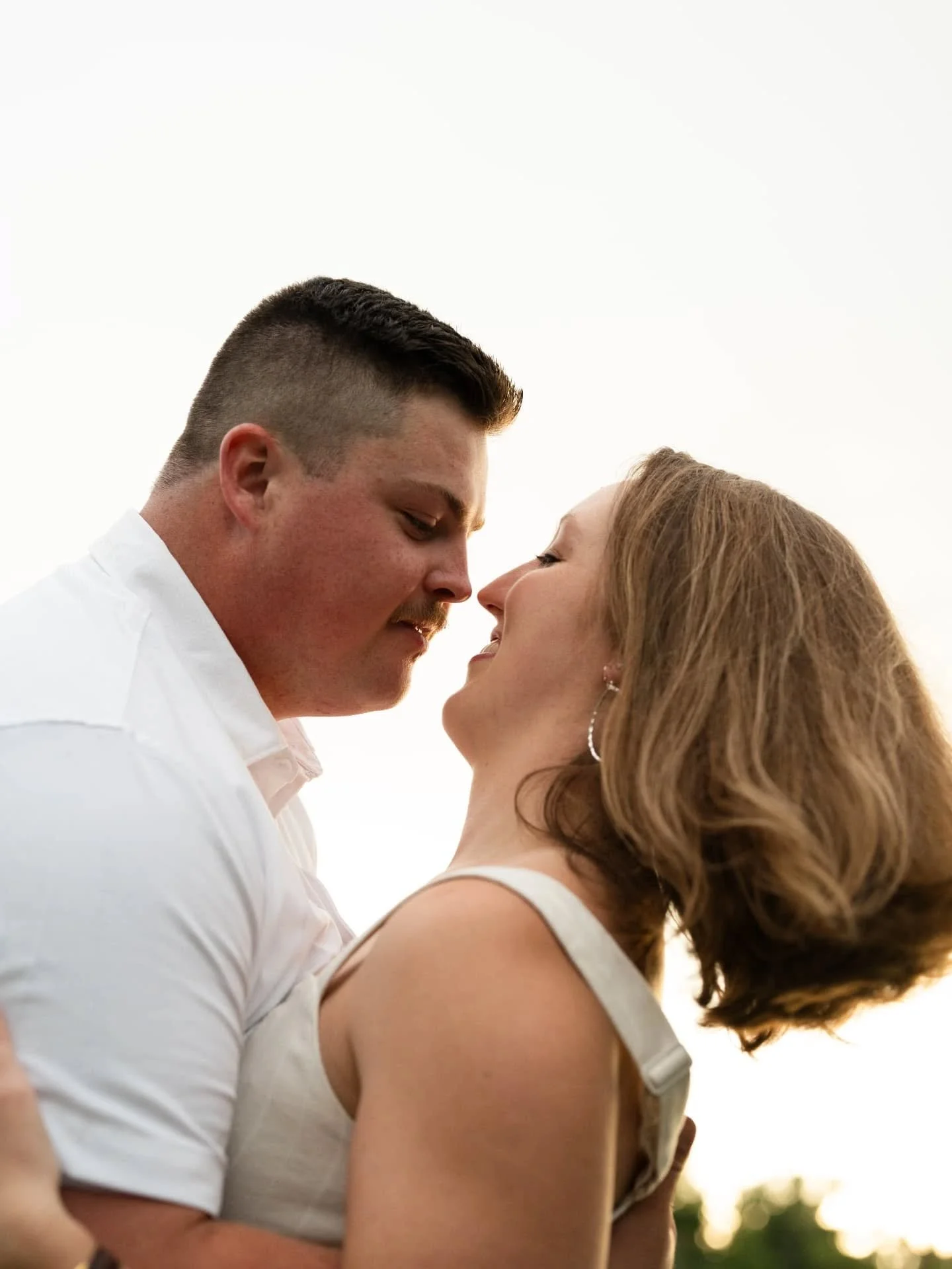 I was watching the weather the day before Elise and Nathan's shoot. When I saw it was supposed to rain, I asked the pair if they wanted to reschedule a little later in the week. Their reply, &quot;wouldn't be terribly upset if we got some cute ones i