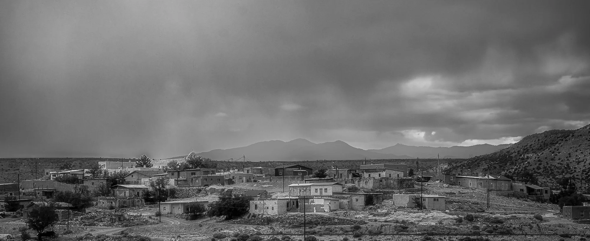 ROUTE 66 3RD PLACE: STEVEN YABEK - "Pueblo Rainsong." The Laguna Pueblo was formally established in 1699, following the Pueblo Revolt. The original 1926 Route 66 alignment through Laguna, New Mexico, currently designated as New Mexico Highway 124 and