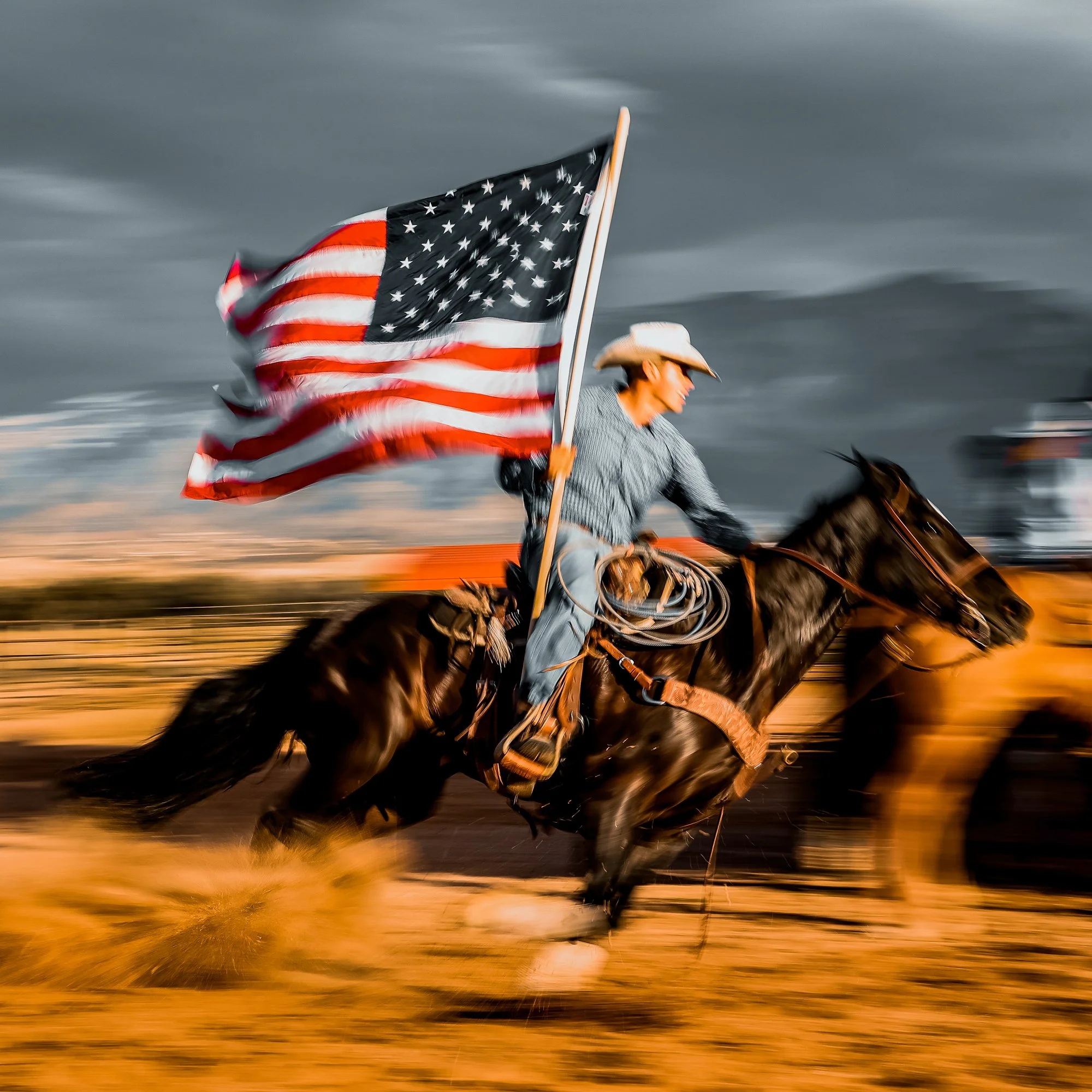PEOPLE 1ST PLACE: JIM SHEPKA - "Rodeo Wrangler." I captured this Americana themed image as the wranglers entered the arena at the Annual 4th of July "Freedom Rodeo", that was held at the Tamaya Horse Rescue facility.  I wanted to express additional m