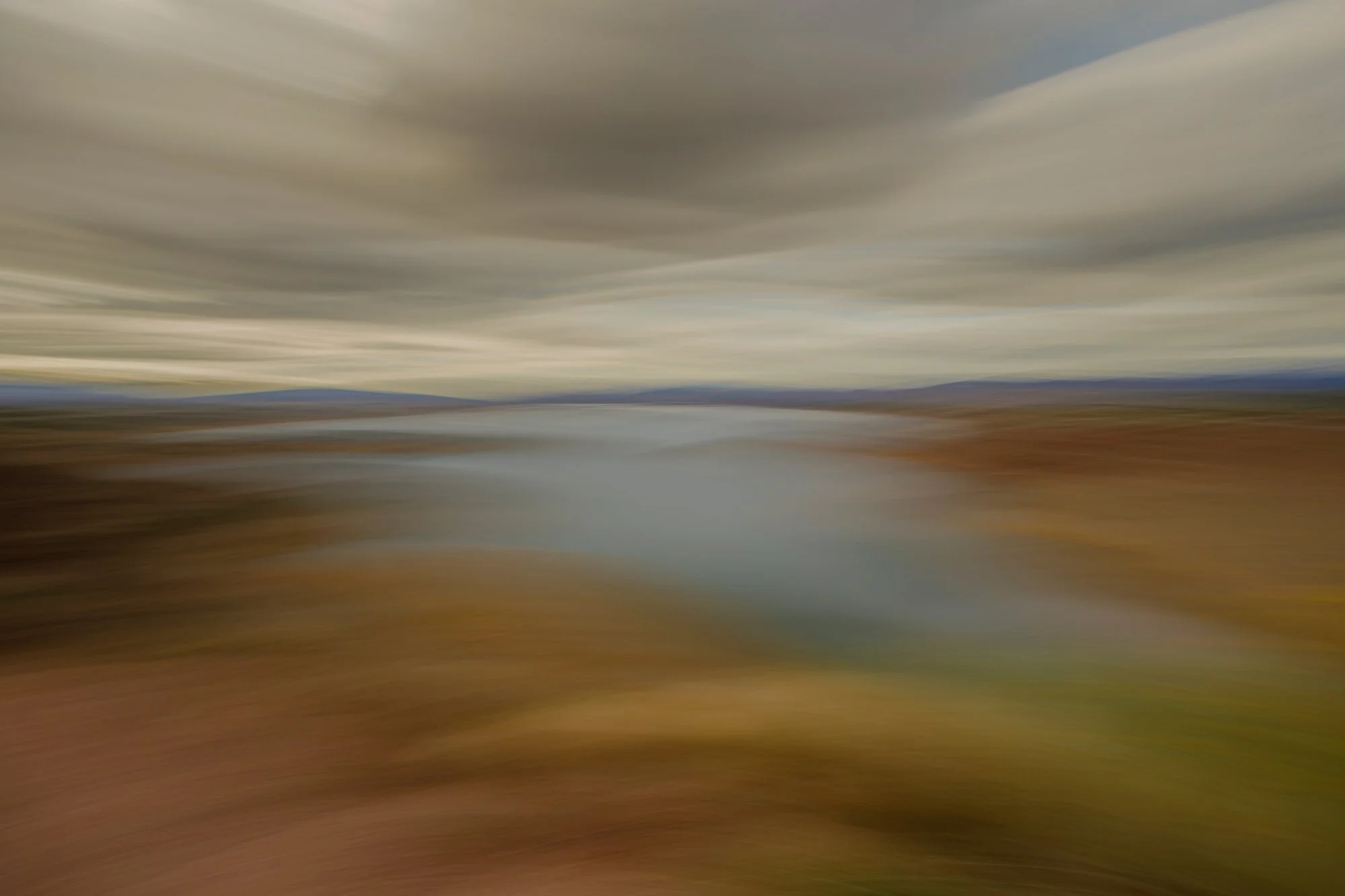 LANDSCAPE 2ND PLACE: ROB LANG - "Autumn, Abiquiu Lake." It was the beginning of Fall in Abiquiu. The sun was still a little high, but clouds started coming in. The feeling of Abiquiu is captured in the light, movement and colors. I move with the land