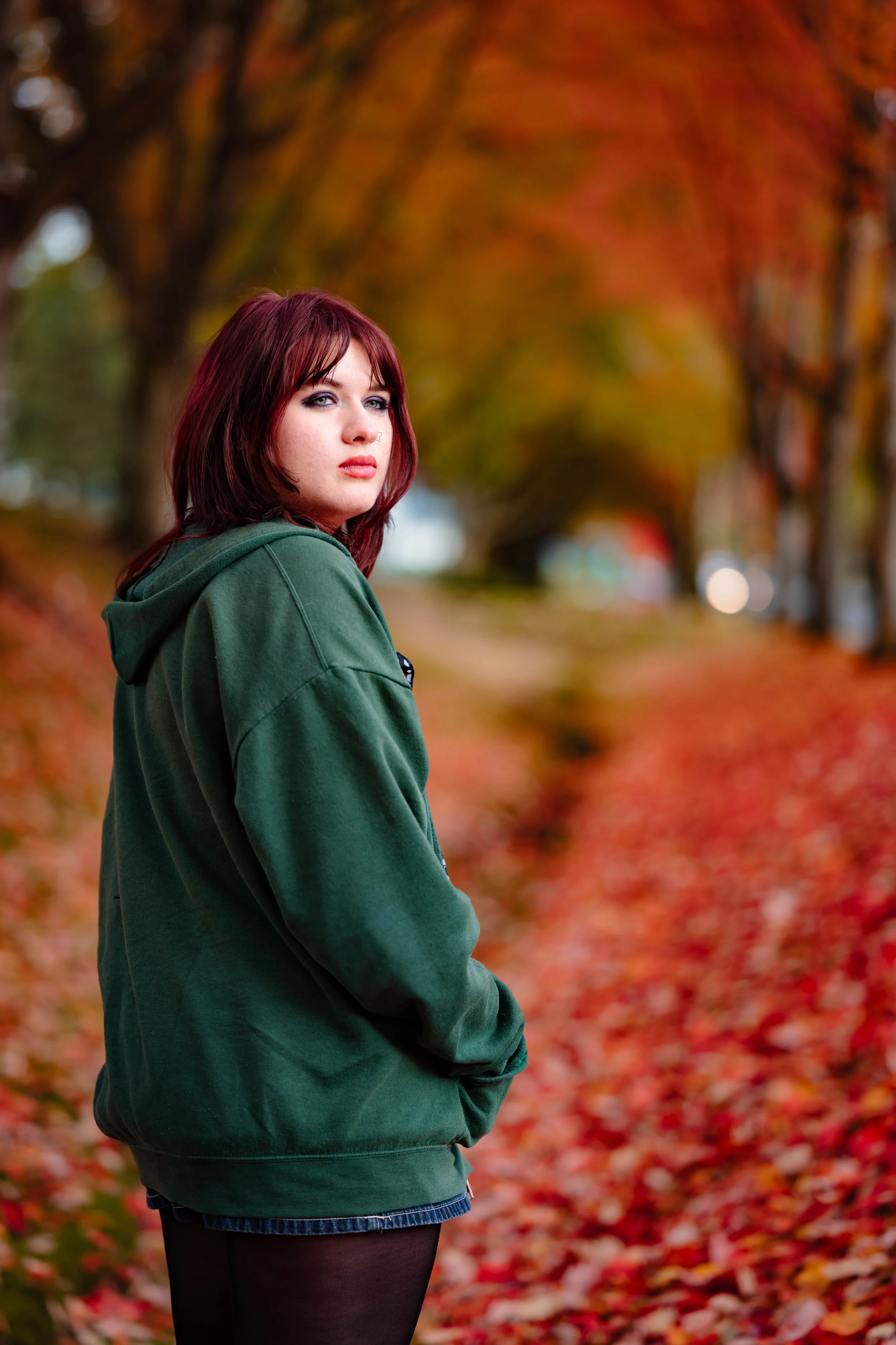 Professional phtoograph of Highschool Senior with fall foliage in Bothell, Washington