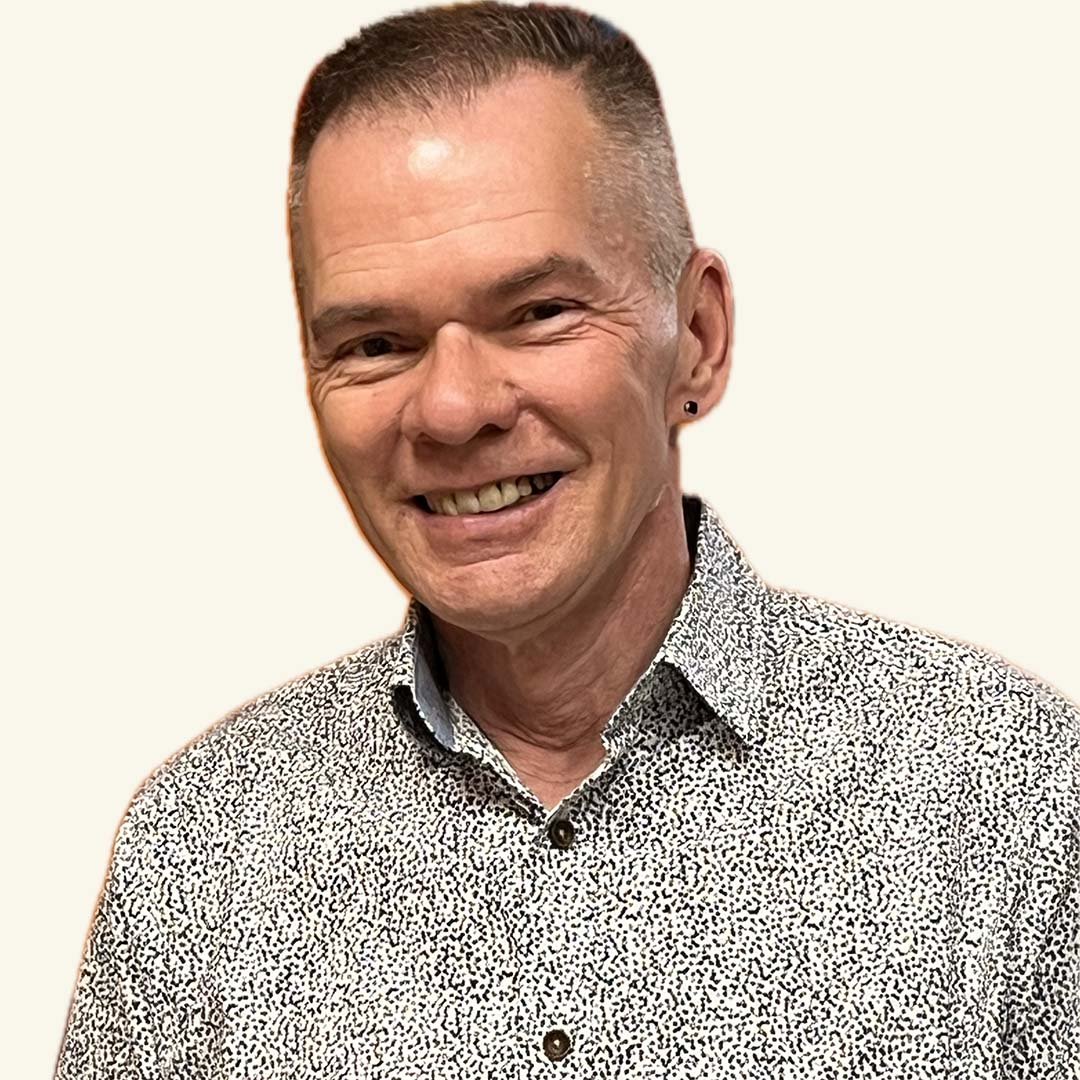 Headshot of John Setterlund smiling at the camera