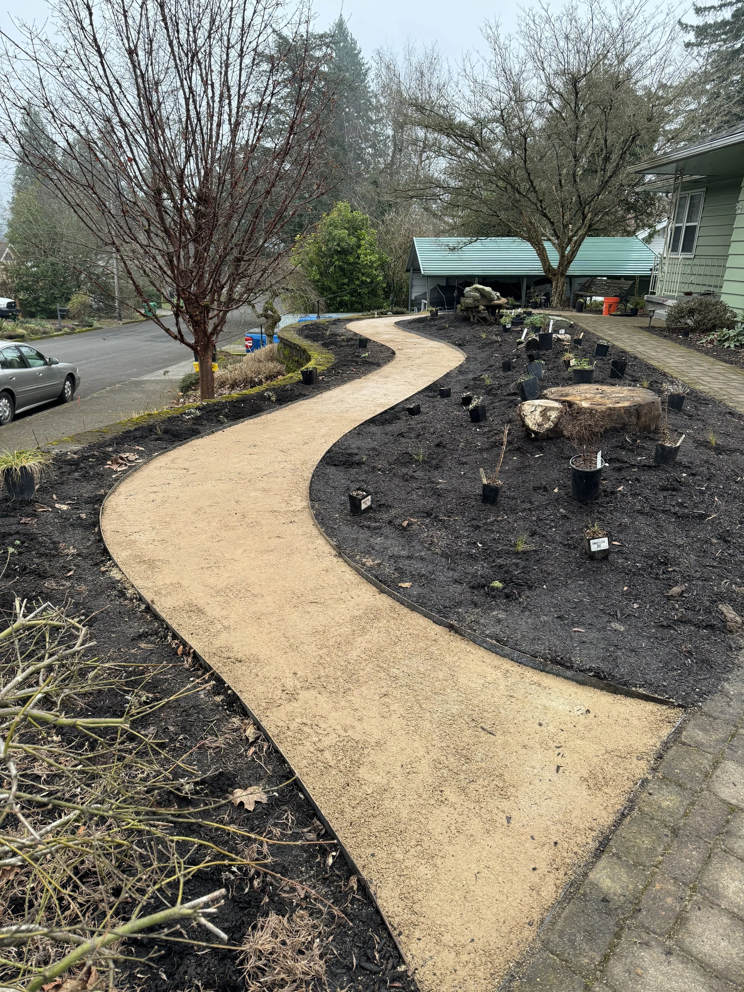 Stabilized decomposed granite walkway with steel edging in Gresham, OR