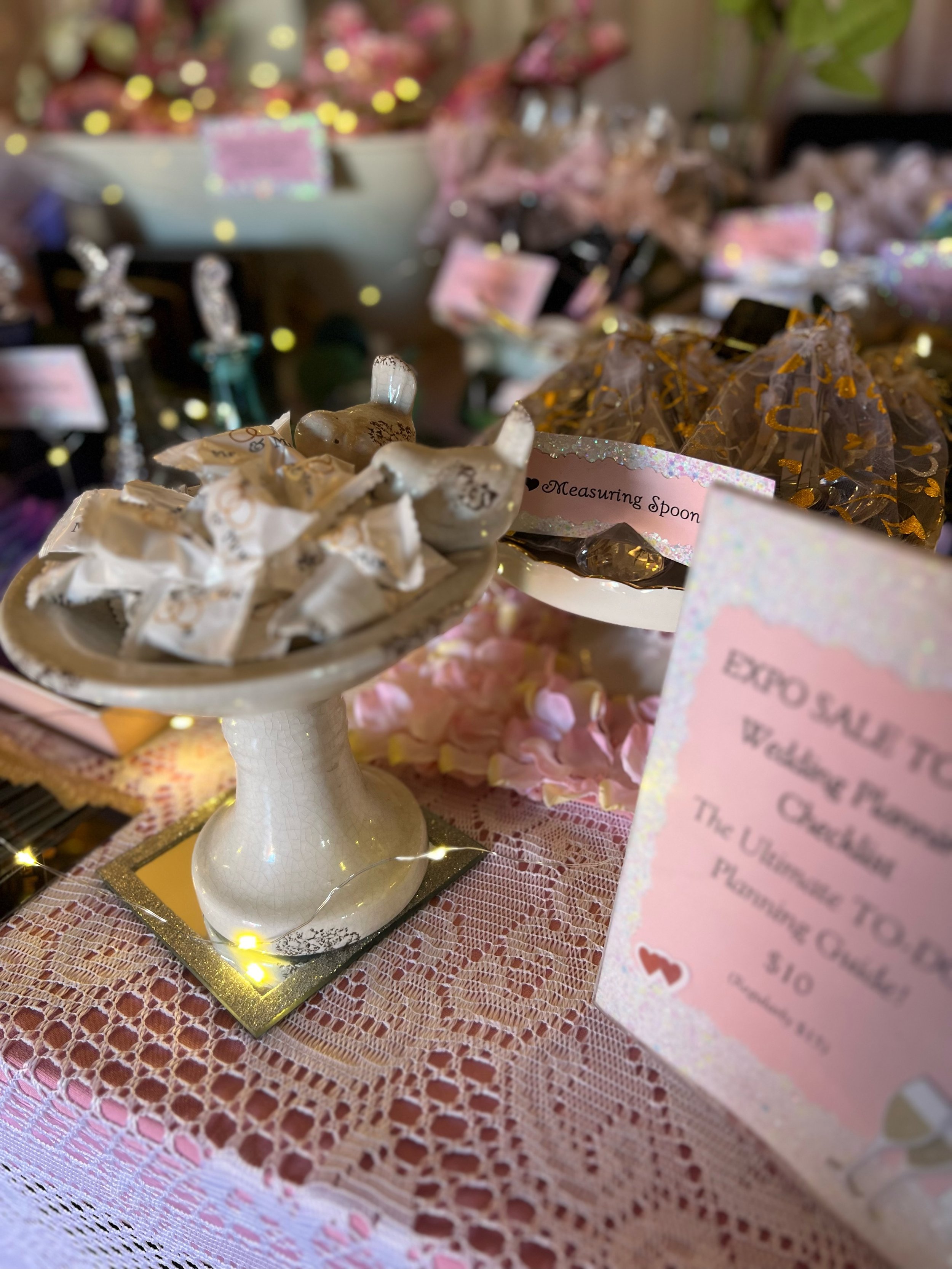 Assorted decorative items and gifts displayed on a table. with other gift opportunities.