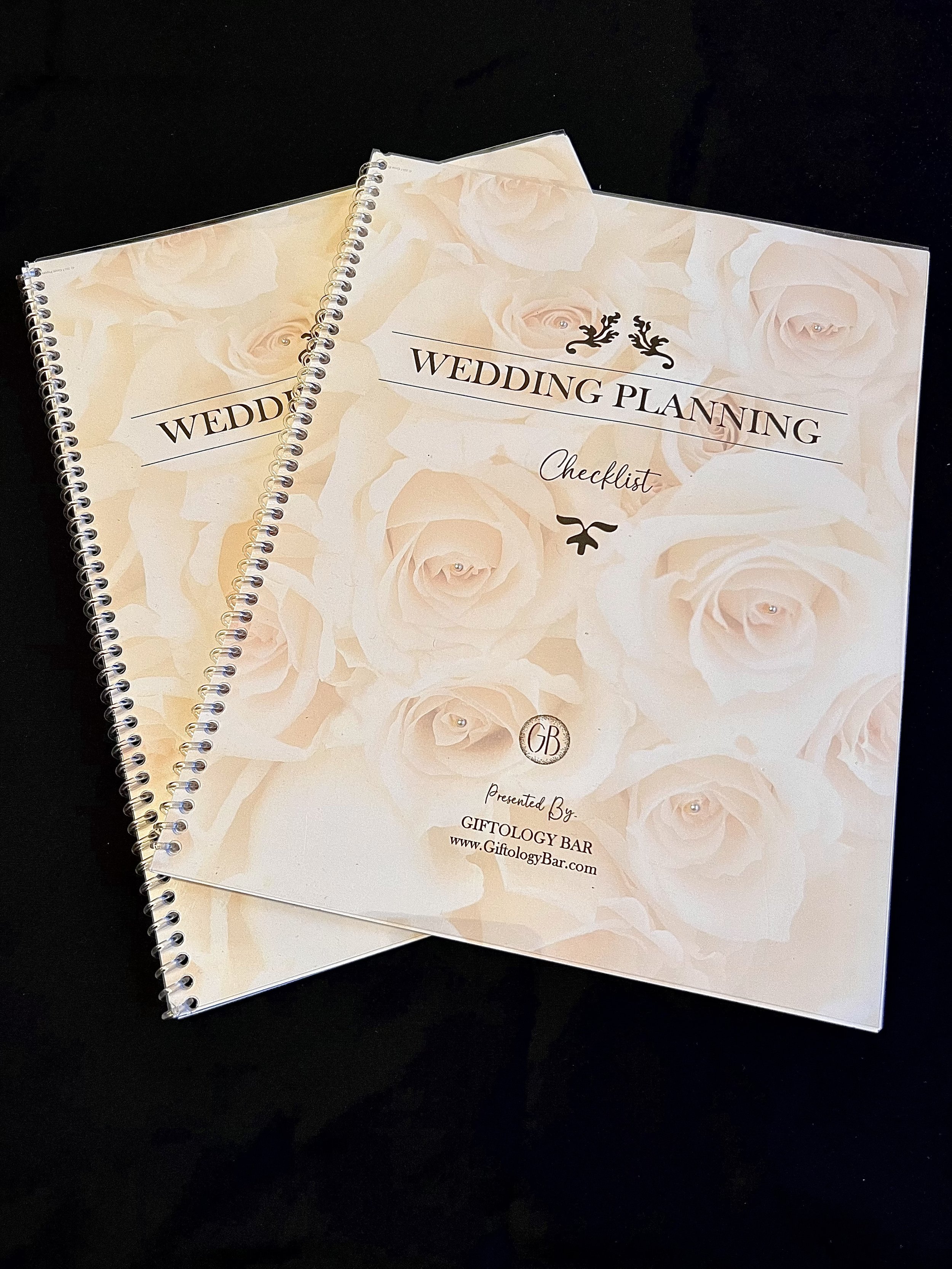 Two spiral-bound wedding planning Wedding Checklists. $16