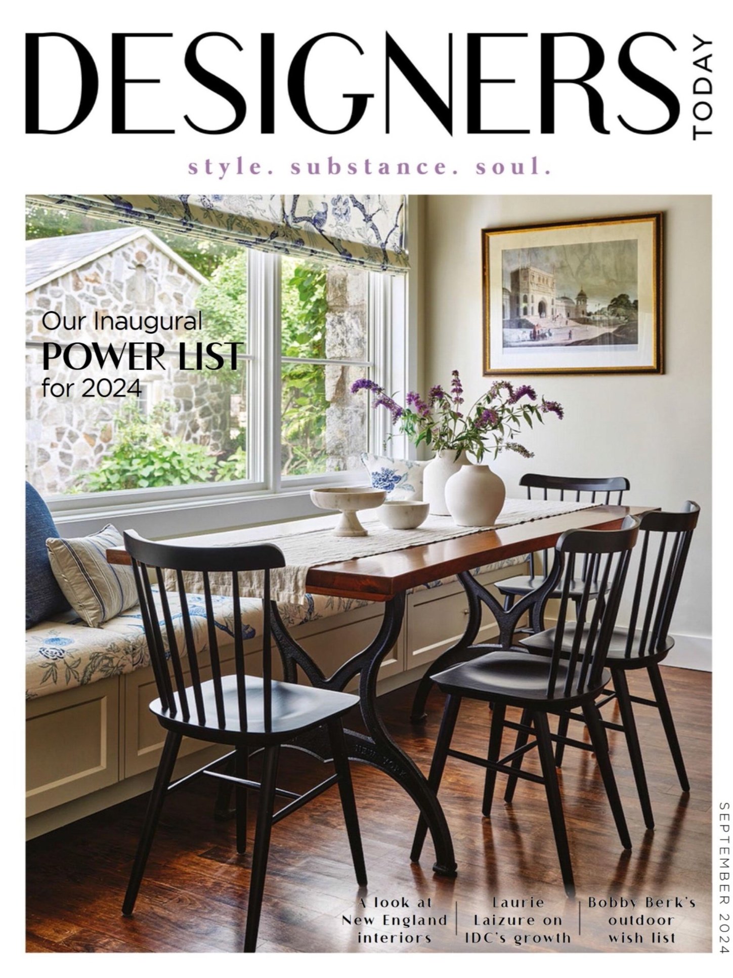Magazine cover titled 'Designers Today' featuring a dining area with a wooden table, black chairs, a floral couch, and a window view of a stone structure. The text mentions the inaugural Power List for 2024 and includes topics like New England interiors and IDC's growth. It's the September 2024 issue.
