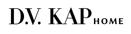 D.V. KAP HOME logo in black text
