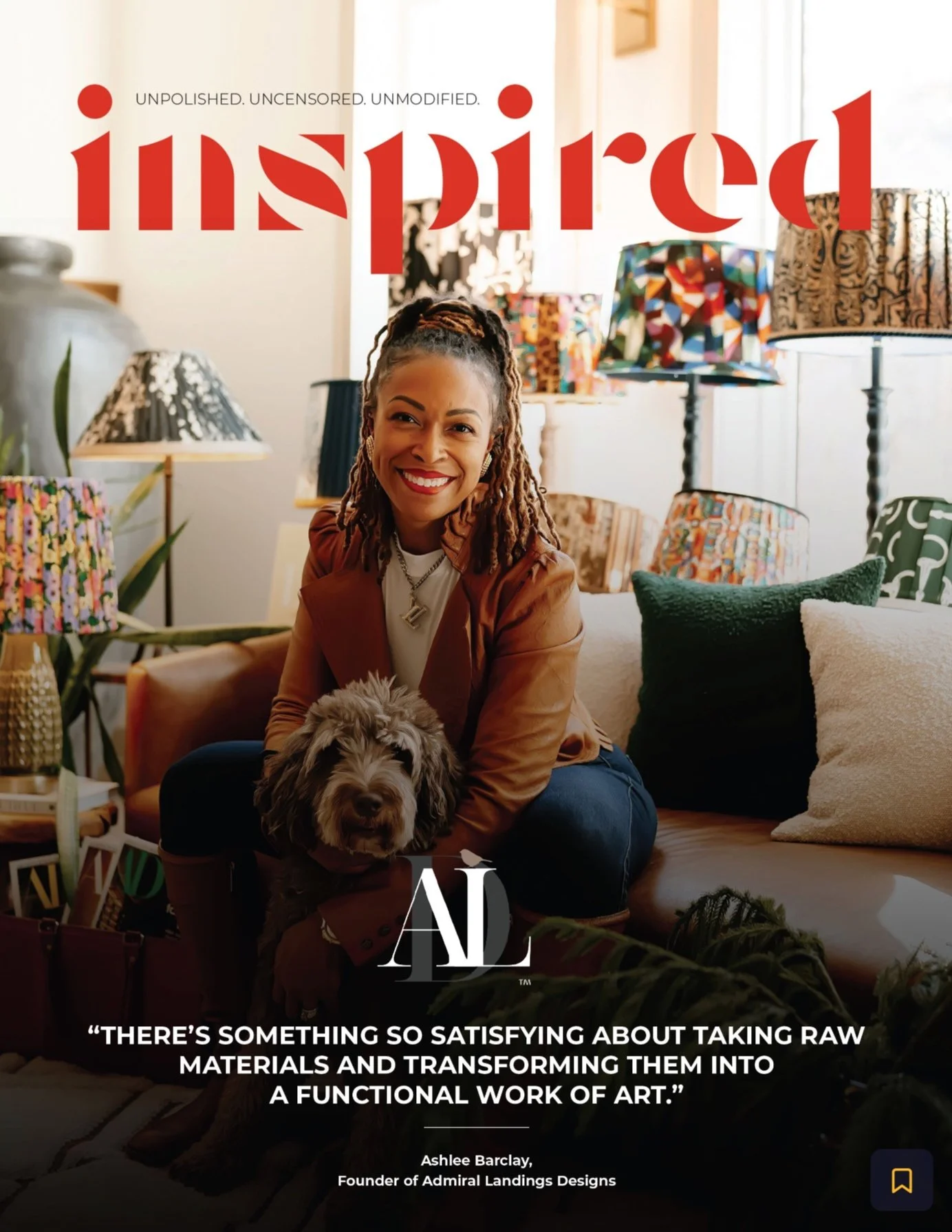 A woman sitting on a couch with a dog in a room filled with colorful lamp designs. The text on the image reads 'Inspired' and features a quote about creating art from raw materials by Ashlee Barclay, Founder of Admiral Landings Designs.