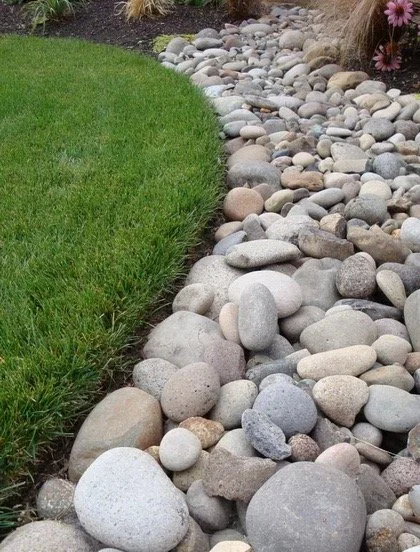Rock installation in Prior Lake MN by Green Gorilla Lawn Care