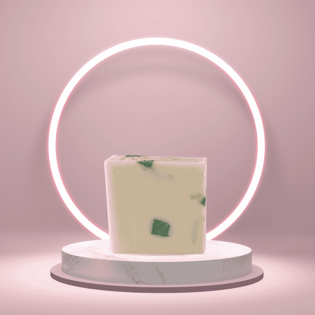 Mercado Verde handmade soap bar on a pedestal with a glowing pink ring backdrop