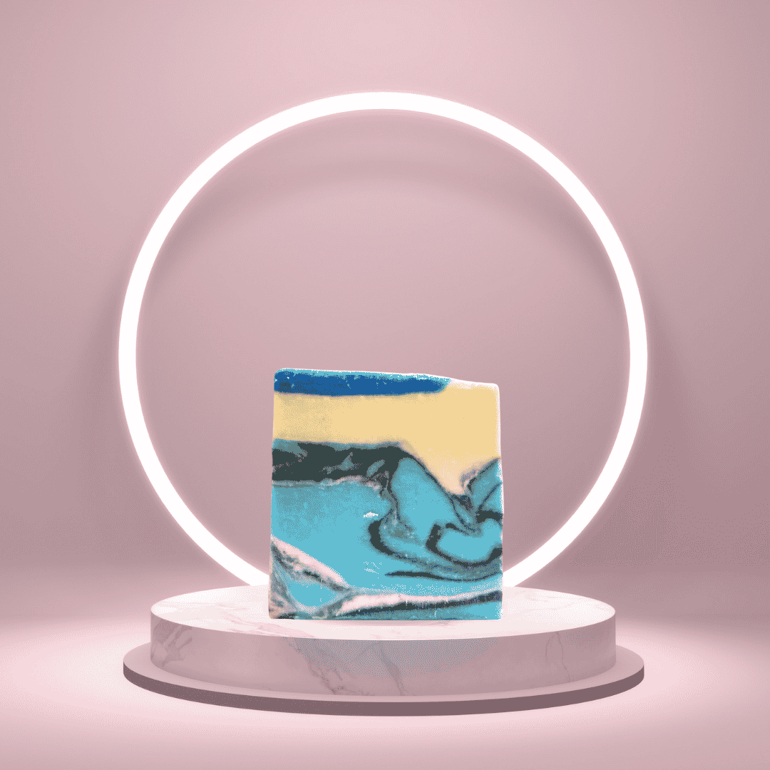 Lowcountry Blue handmade soap bar on a pedestal with a glowing pink ring backdrop