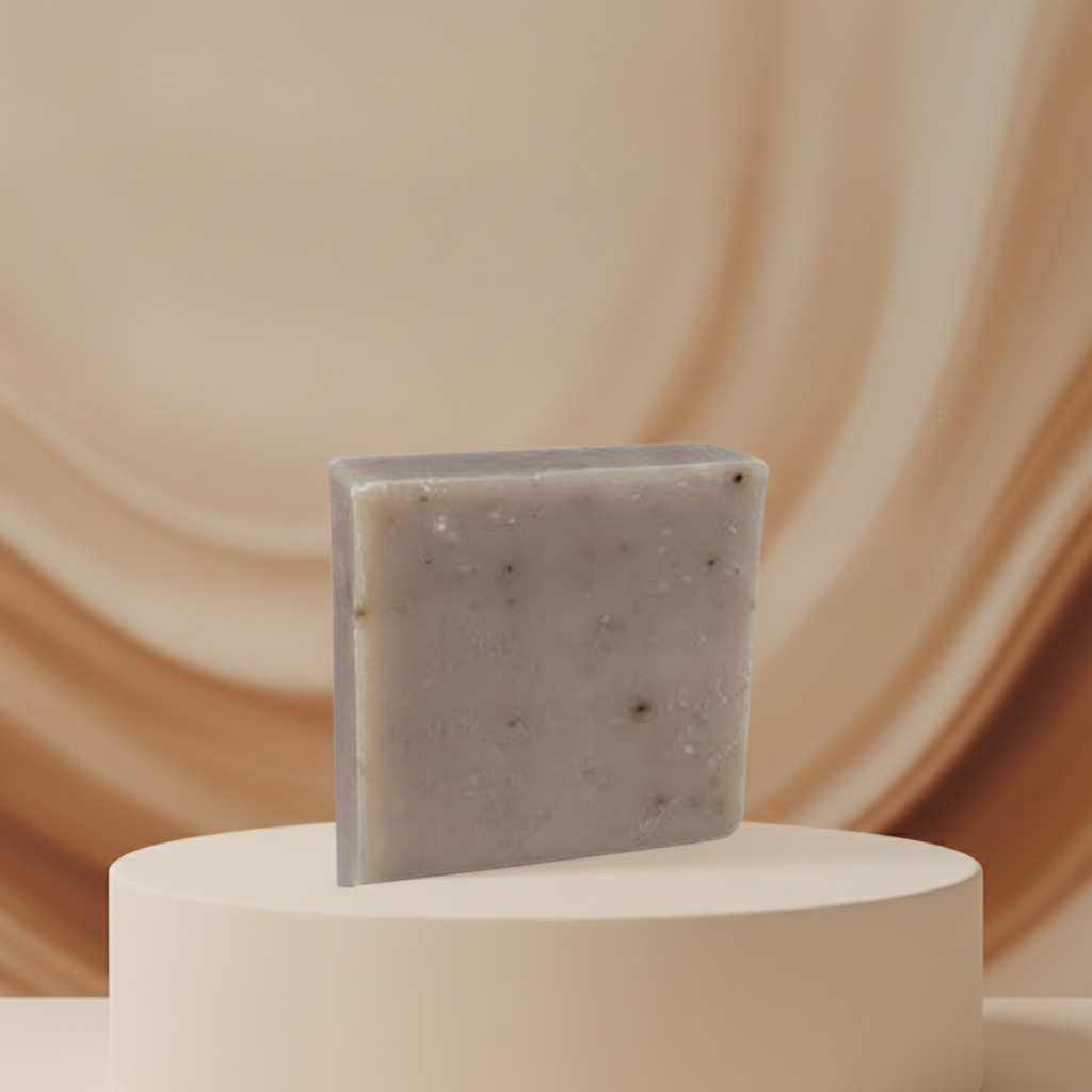 Oatmeal Spice Soap Bar displayed on a cream pedestal against a soft neutral background.
