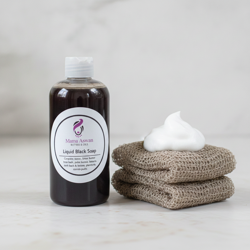 8 oz Liquid African Black Soap beside folded exfoliating mesh cloths and a small mound of white lather.