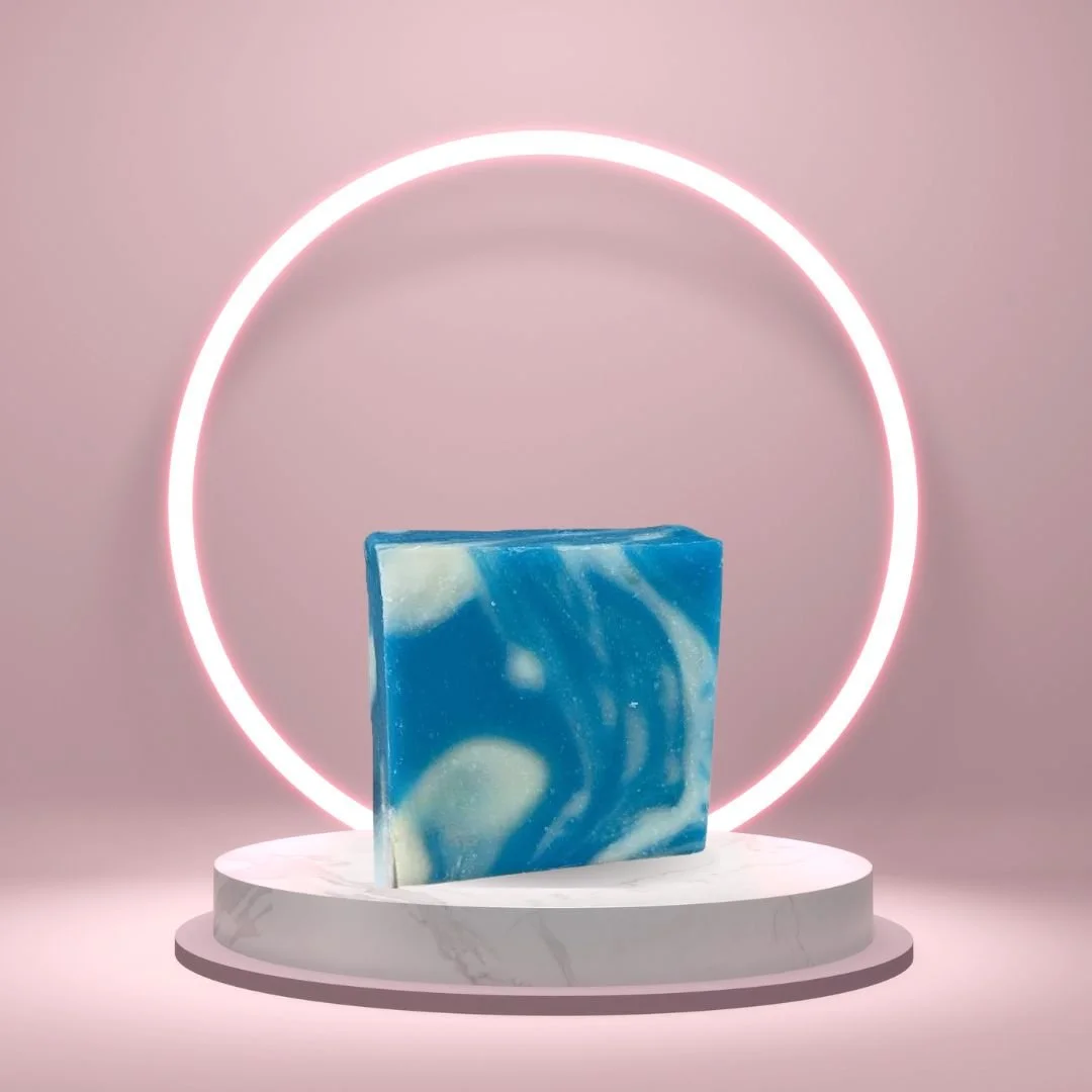 Cool Water Soap Bar on a white pedestal with a glowing pink circle background.