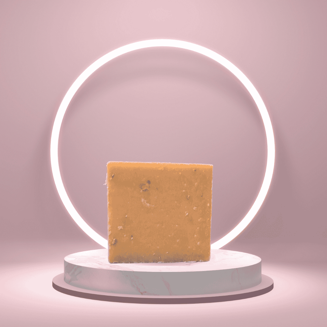 Georgia Girl Glow handmade soap bar on a pedestal with a glowing pink ring backdrop