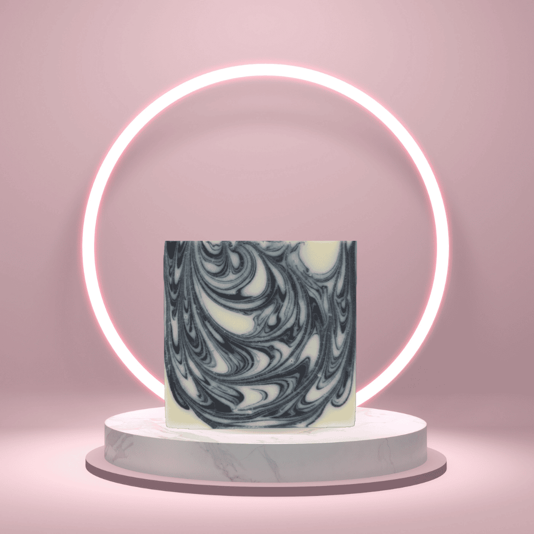Sapeur Swagger handmade soap bar on a pedestal with a glowing pink ring backdrop