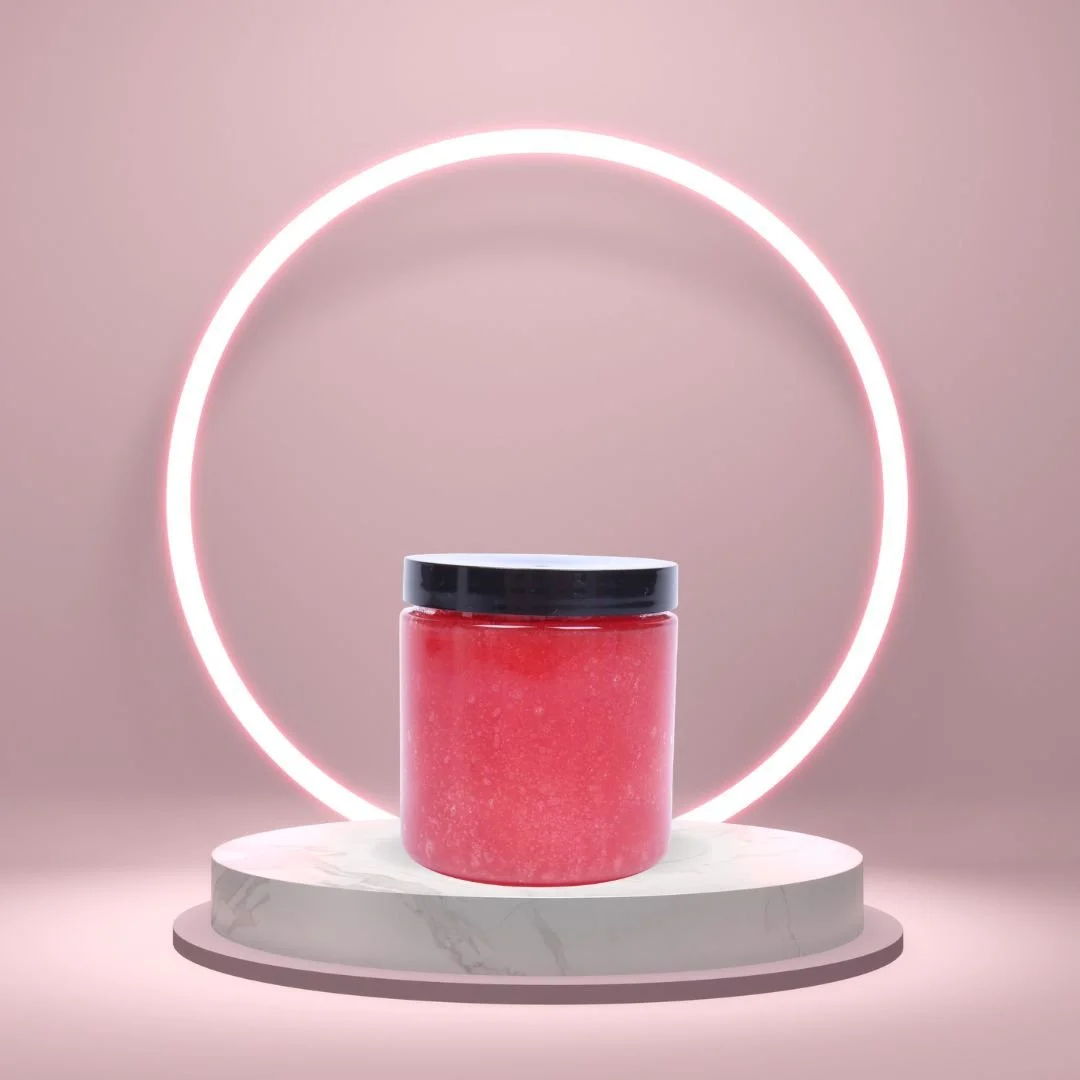 Sugar Scrub Gel jar on a white pedestal with a glowing pink circle background and product text below.