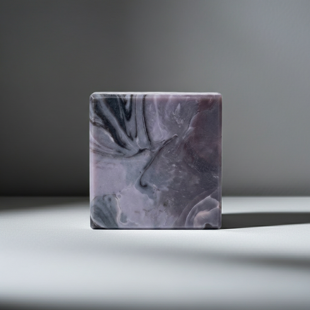 Storm Over the Sahel soap bar in soft shadow with a clean gray background and fresh mineral-rich vibe