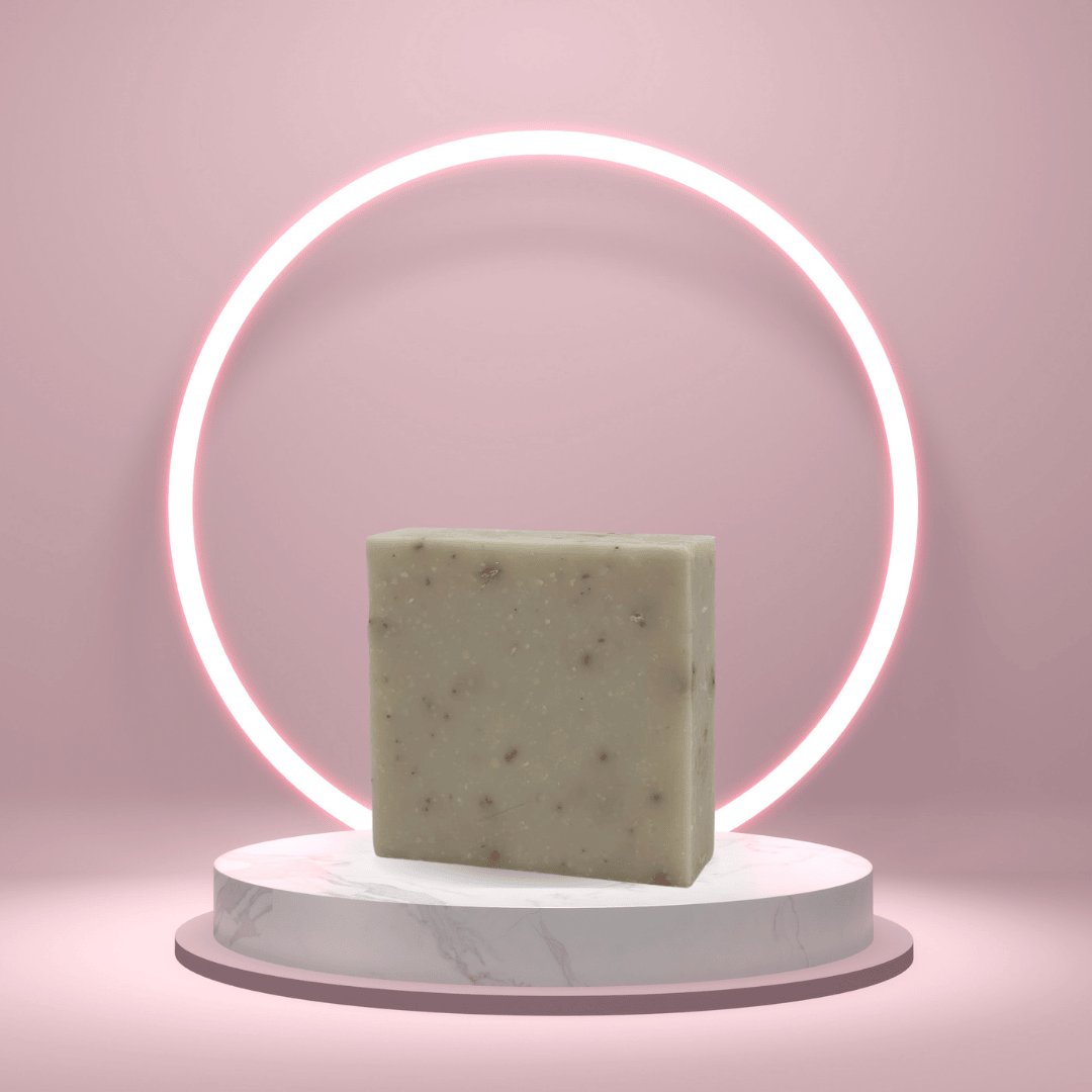 Studio-style product photo of Noite de Carnaval soap with neon halo lighting and a marble pedestal for a modern, editorial look.