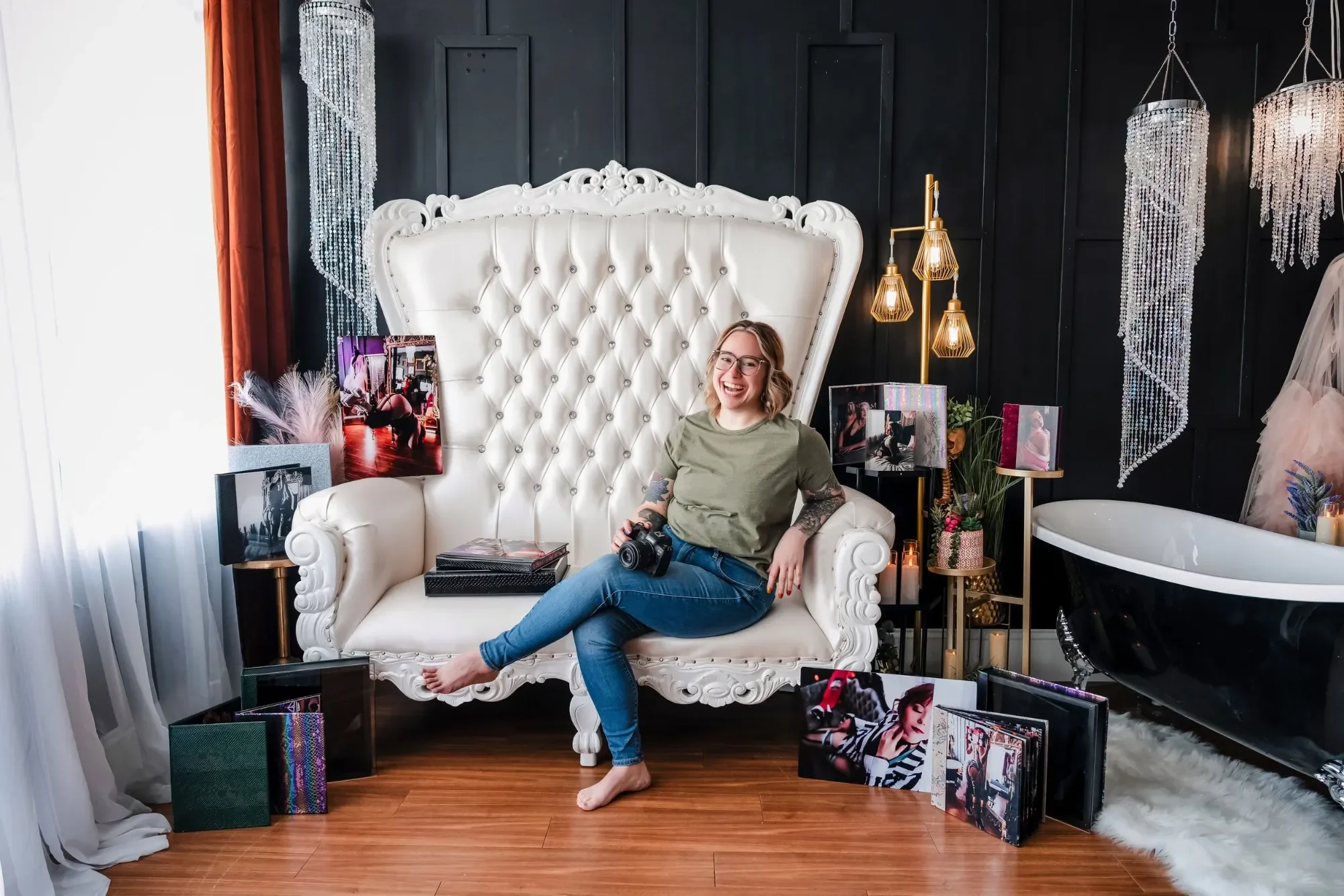 a standing overview photo of STP's luxury printed products laid out on a black table