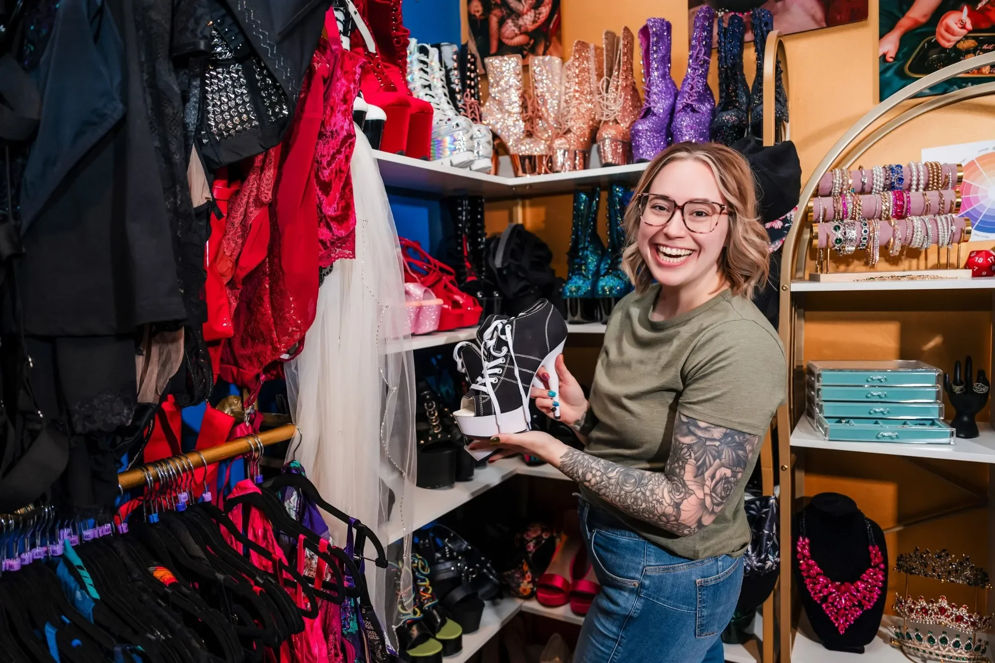 close up of a lush couch in the studio with pillows striped in shiny gold foil patterns