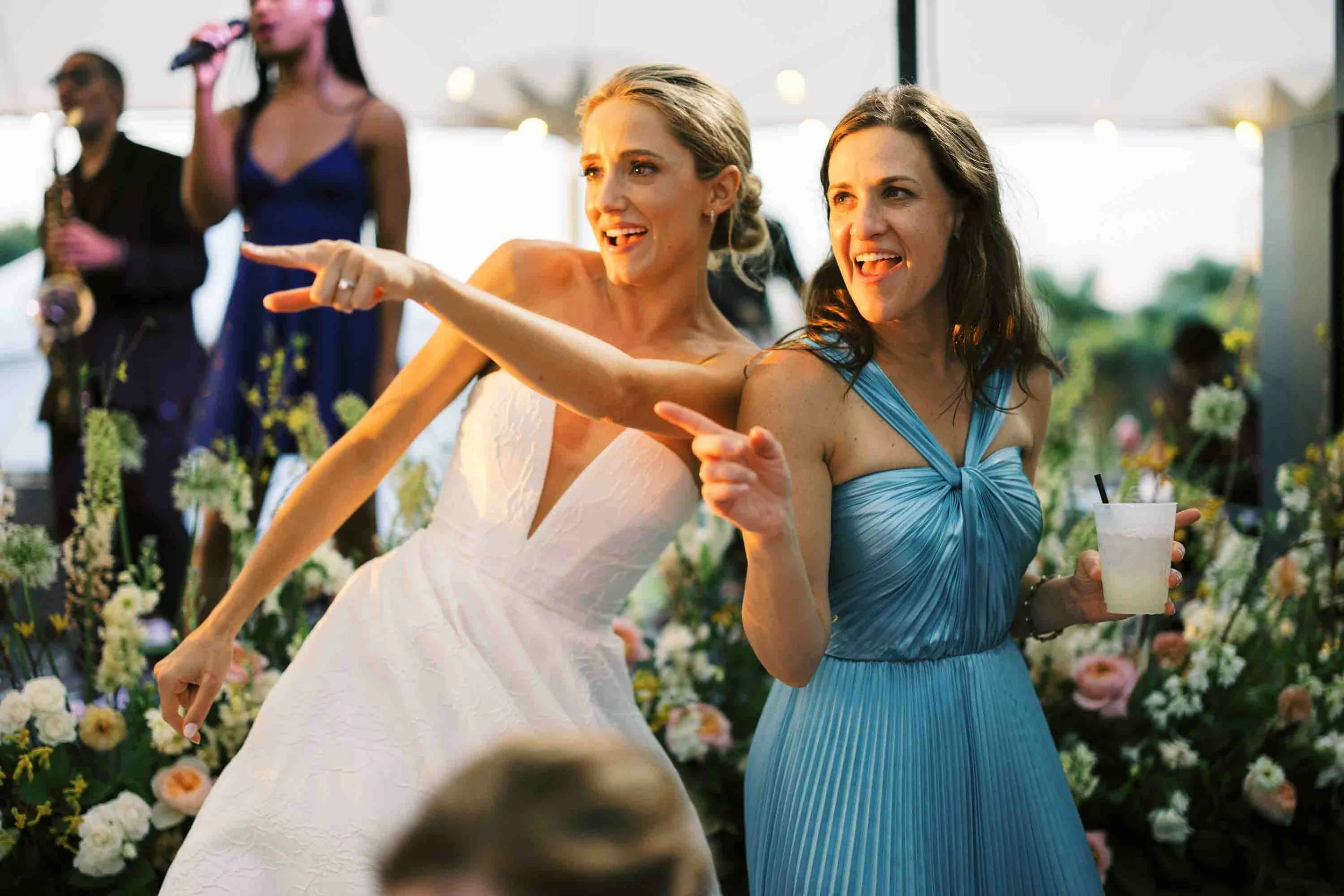 Bride and guests dancing and celebrating on the dance floor at a Kiawah Island wedding reception