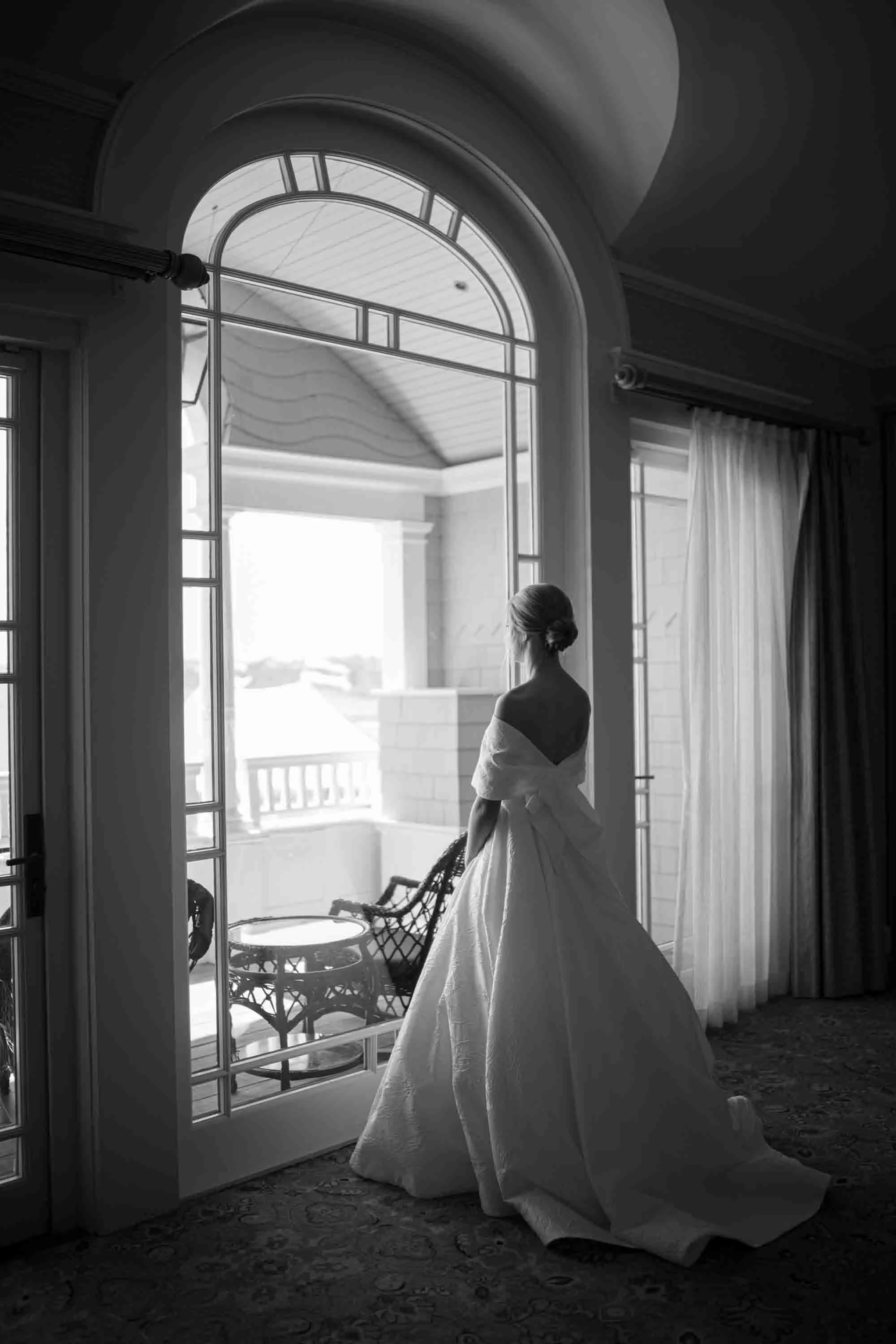 bride window portrait natural light ocean course kiawah island wedding photographer