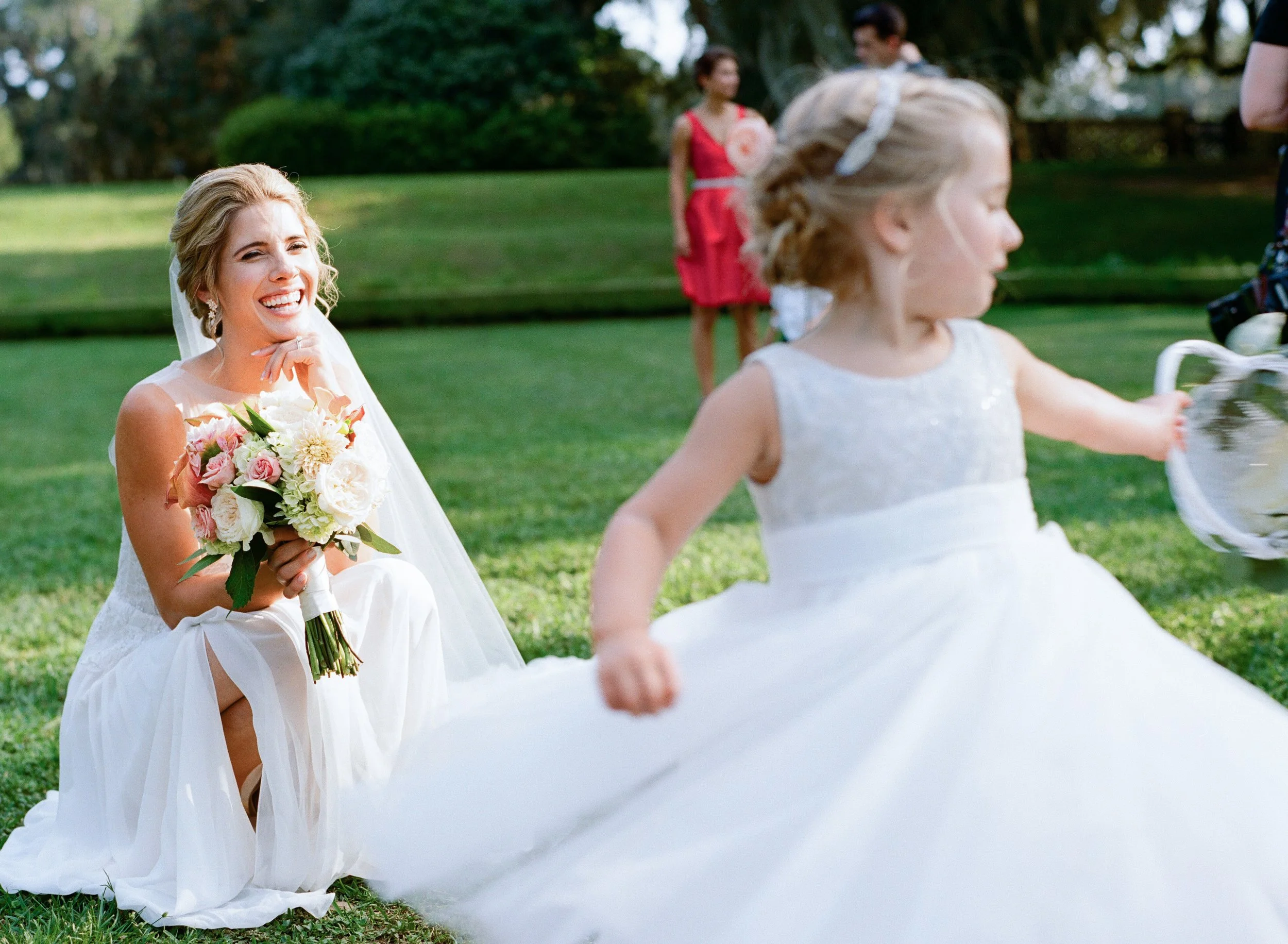 Wedding Day at Middleton Place with a flower girl twirling in the Octagonal Gardens