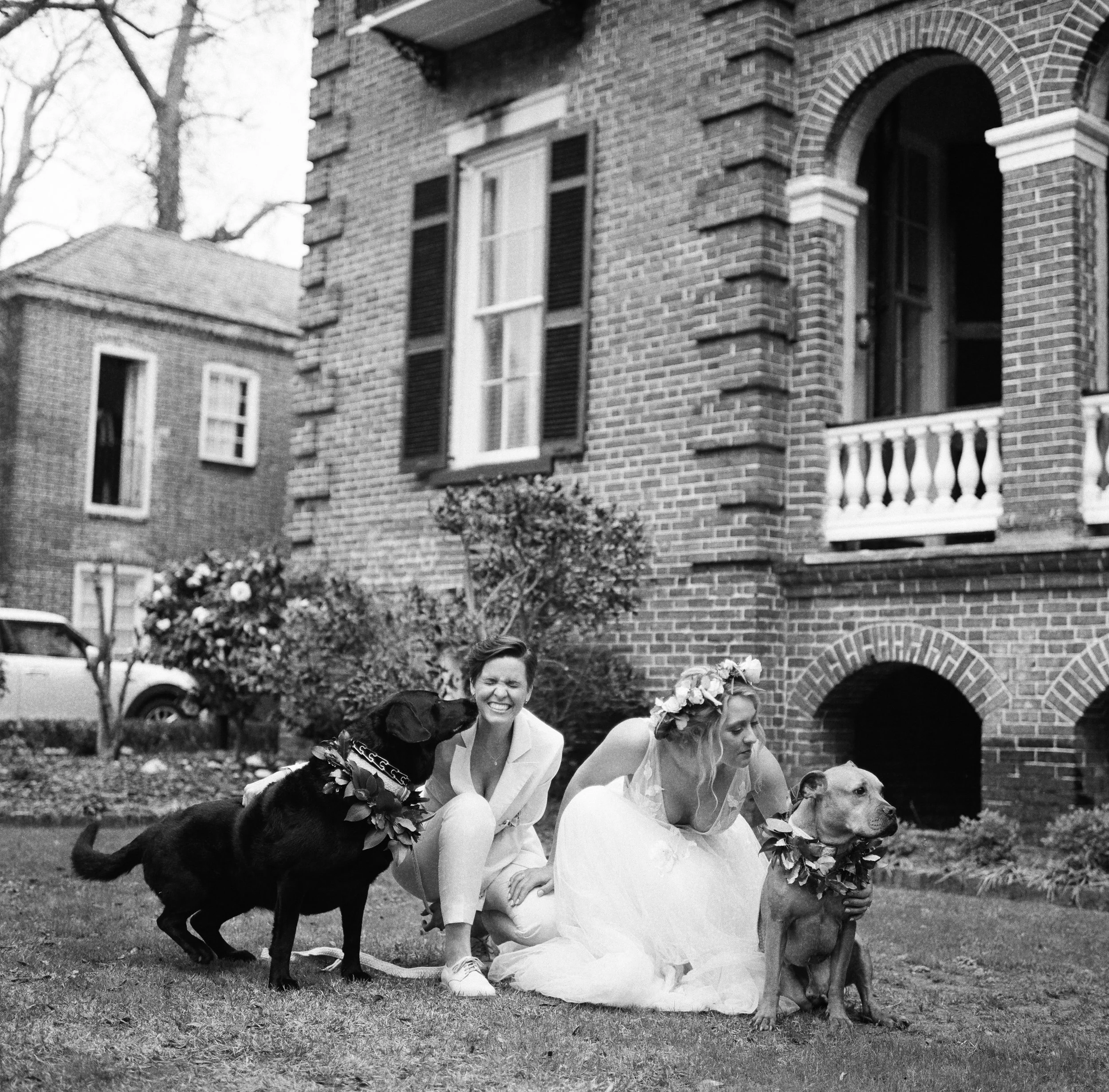 Black and white portrait of same-sex couple at Cannon Green wedding in Charleston, South Carolina