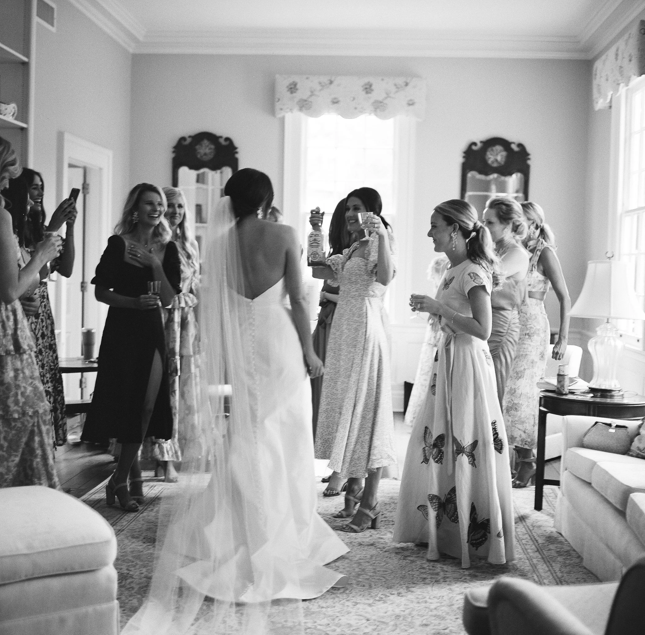 Bride getting ready with bridesmaids at Litchfield Plantation wedding in South Carolina