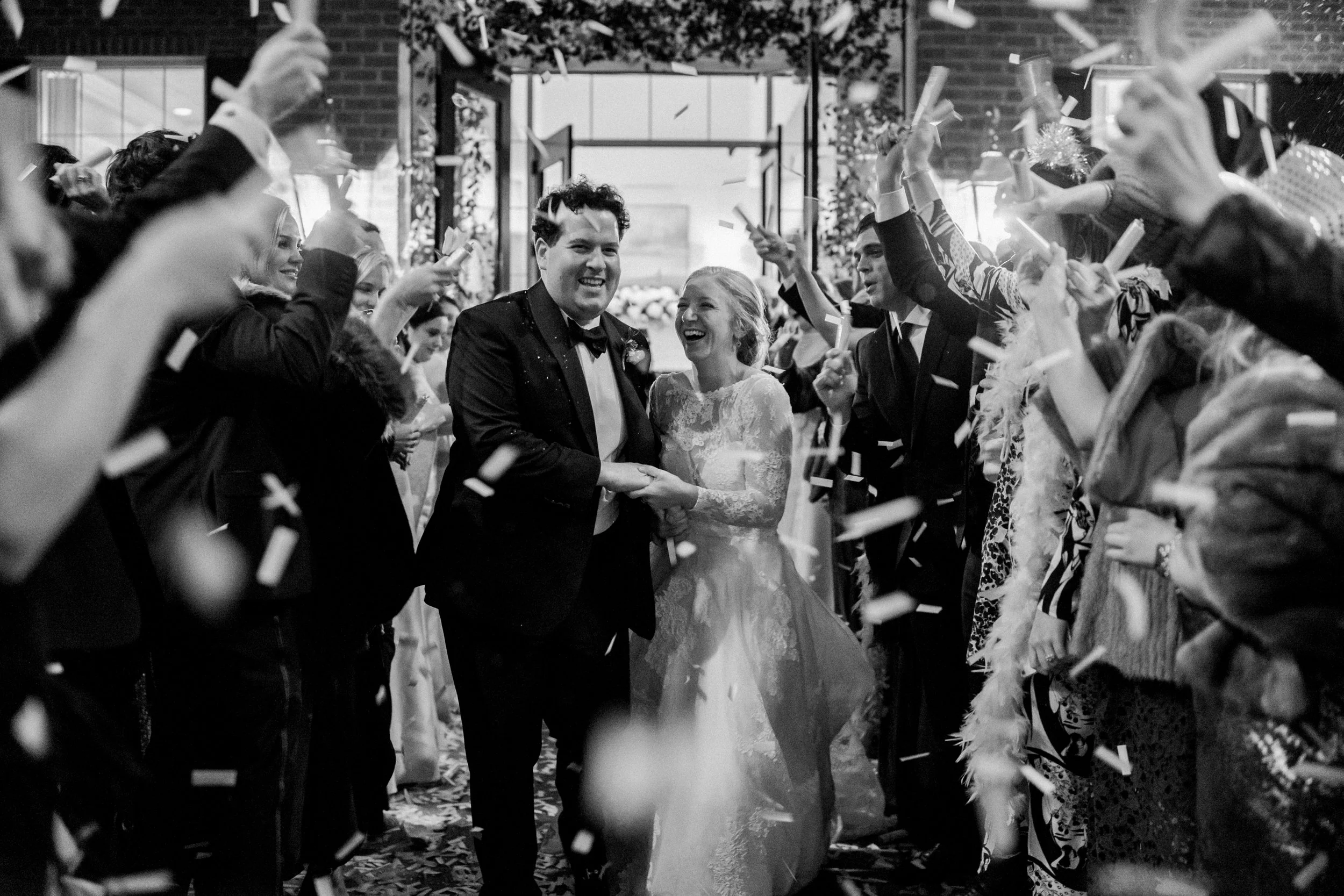 Bride and groom confetti exit at Florence Country Club wedding in South Carolina