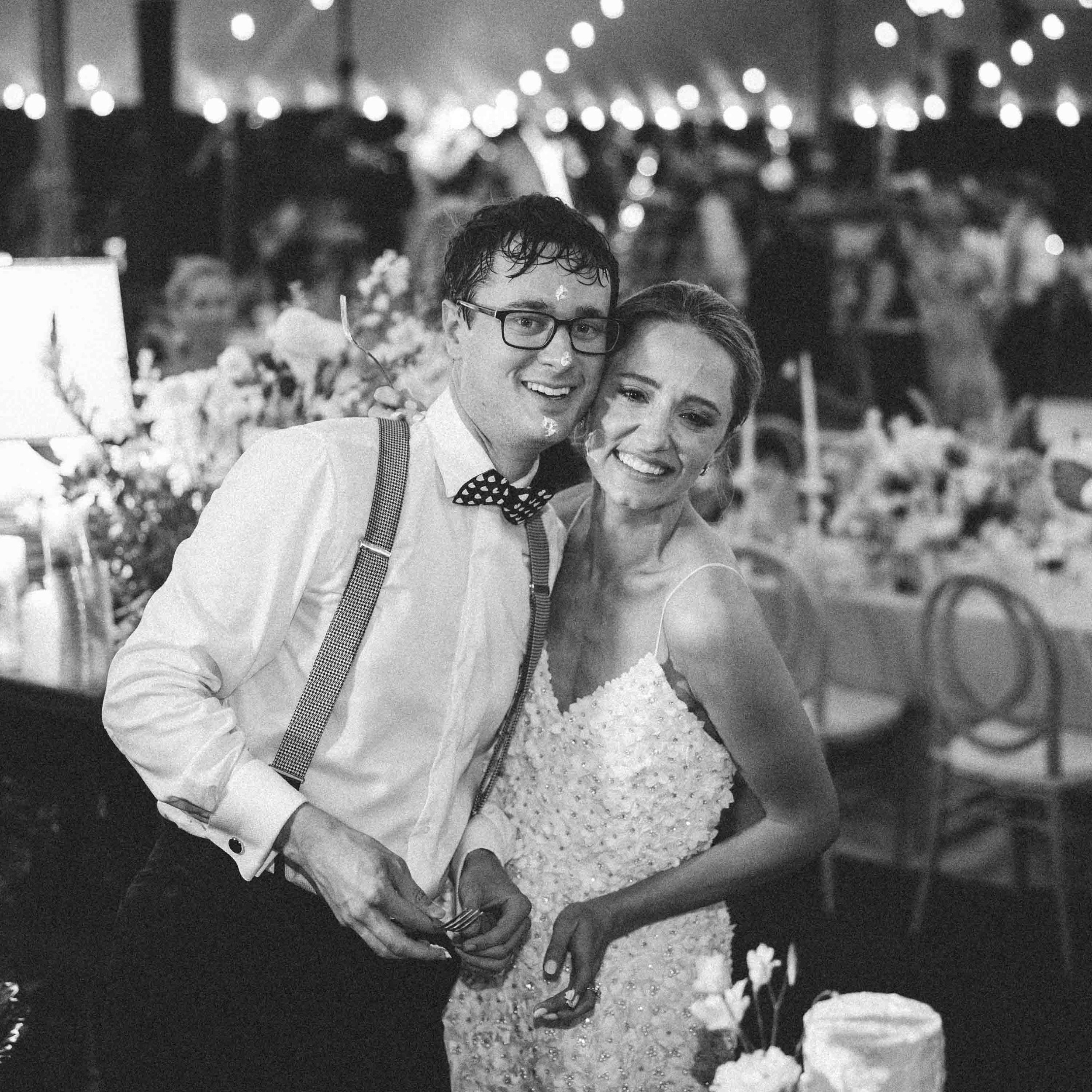 Bride and groom cutting their wedding cake during a reception at Kiawah Island