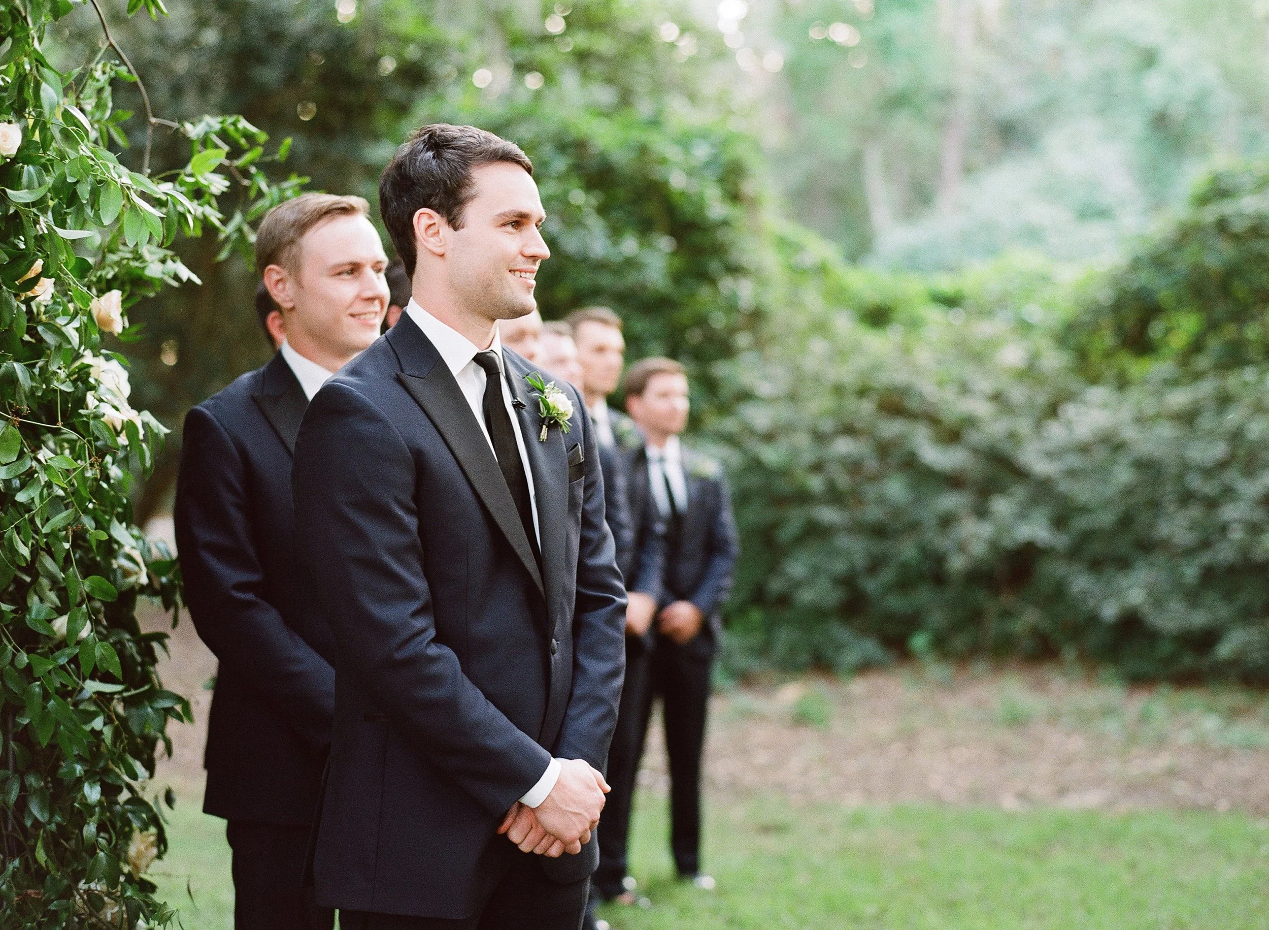 Wedding ceremony beneath live oak trees at Legare Waring House in Charleston