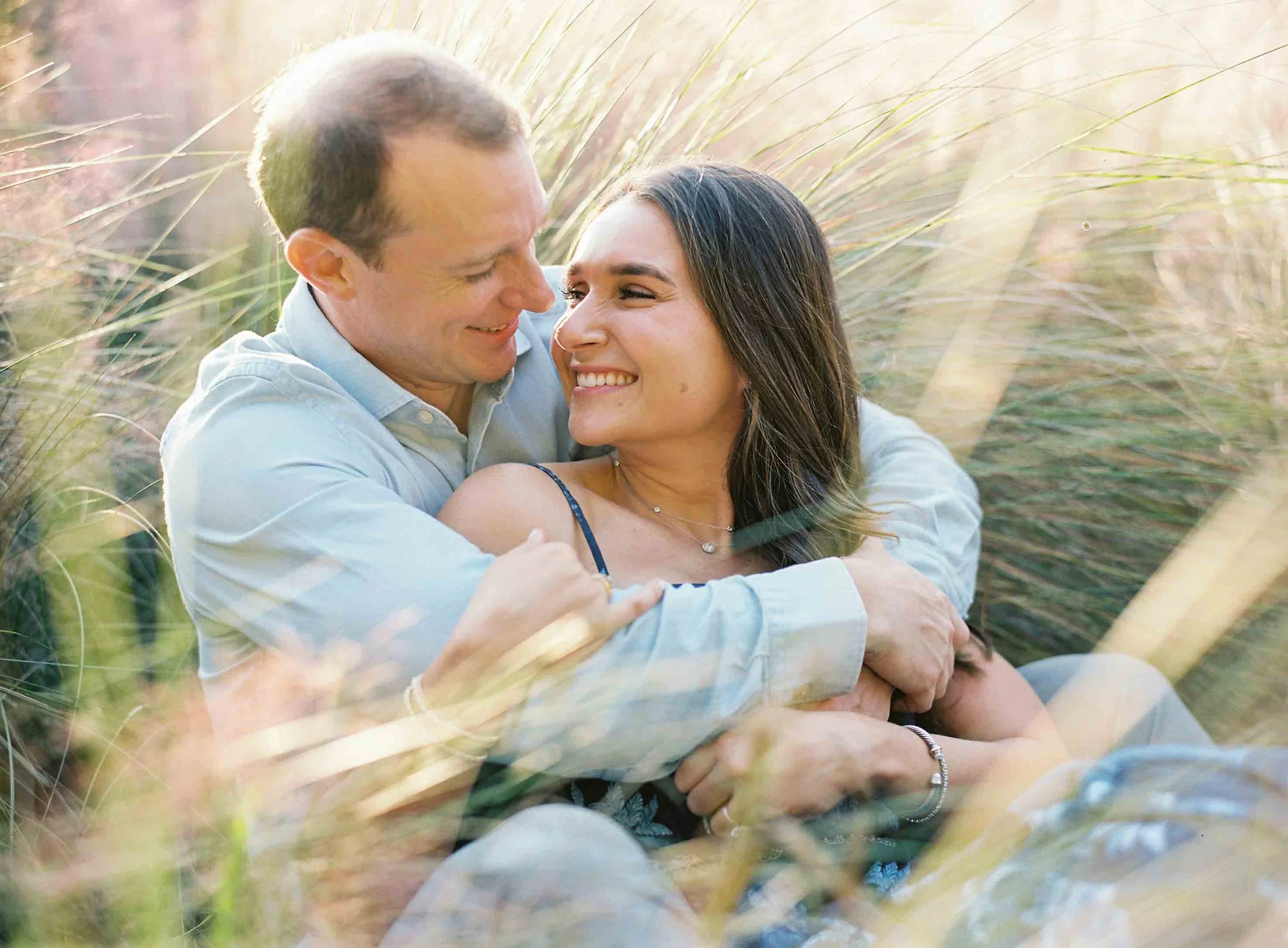 engagement photos at the Ocean Course on Kiawah Island with coastal views