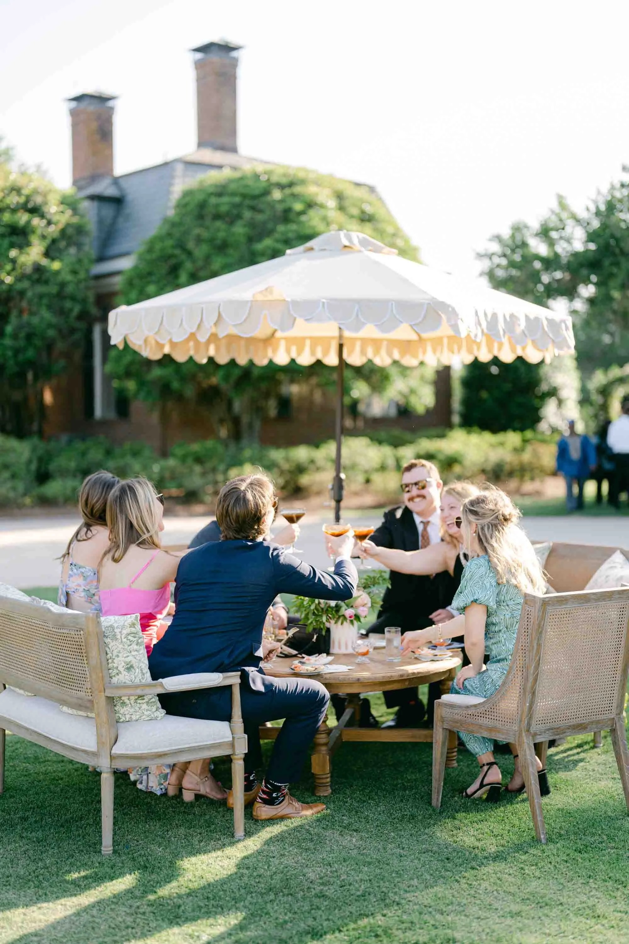 Guests enjoy espresso martinis during a wedding in Yemassee, SC