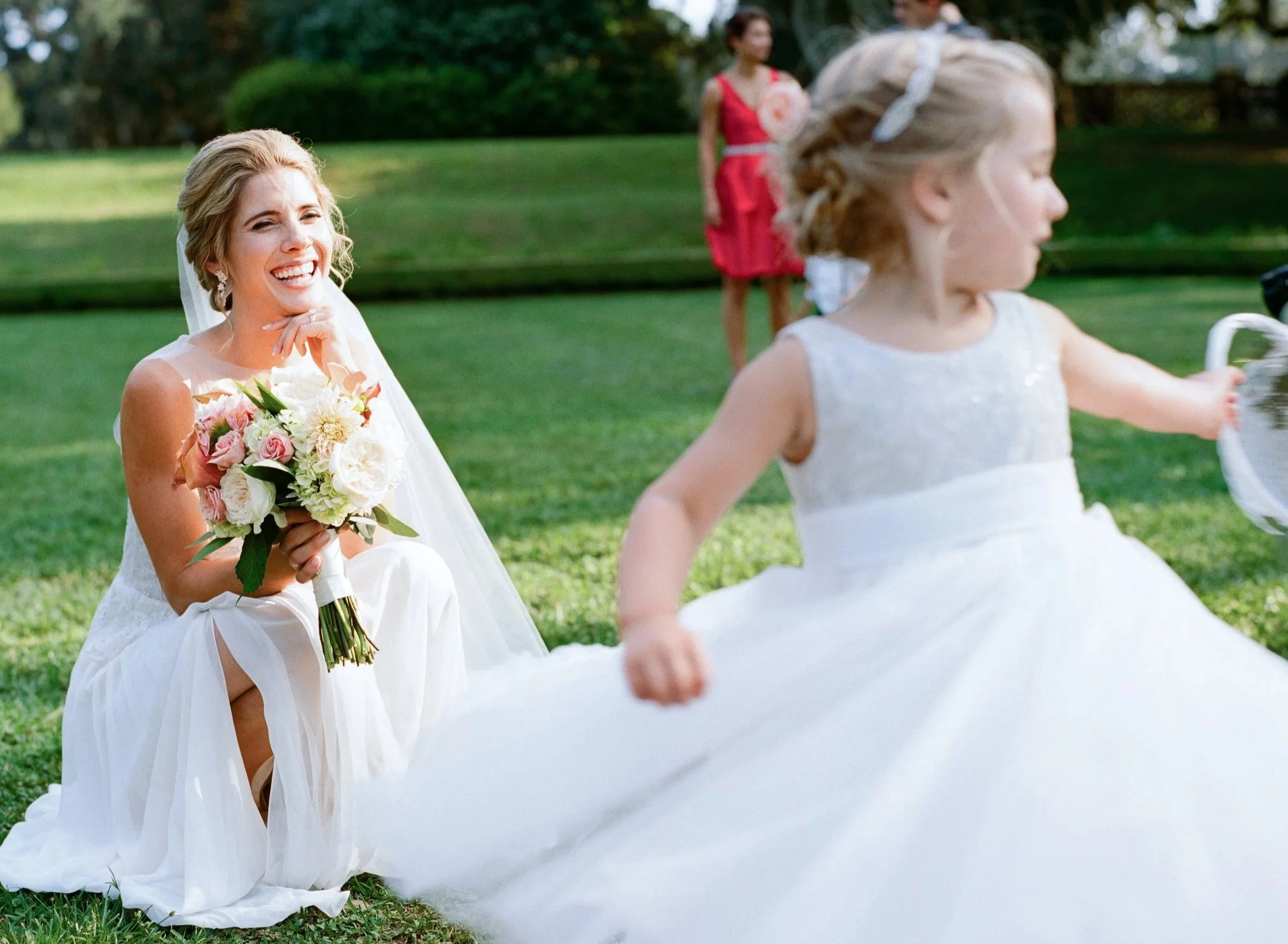 Bride with flower girl at Middleton Place wedding in Charleston South Carolina