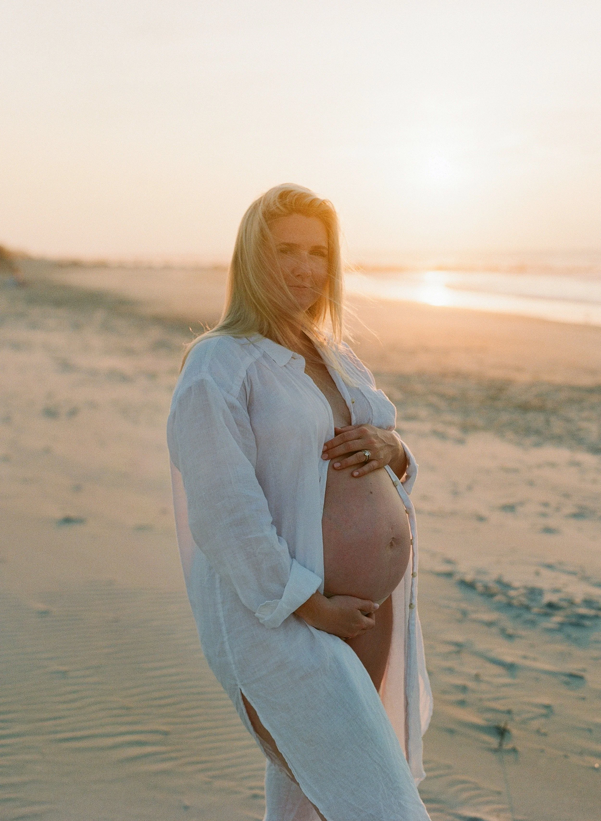 Portrait of Lauren Jonas during her maternity session on Folly Beach.