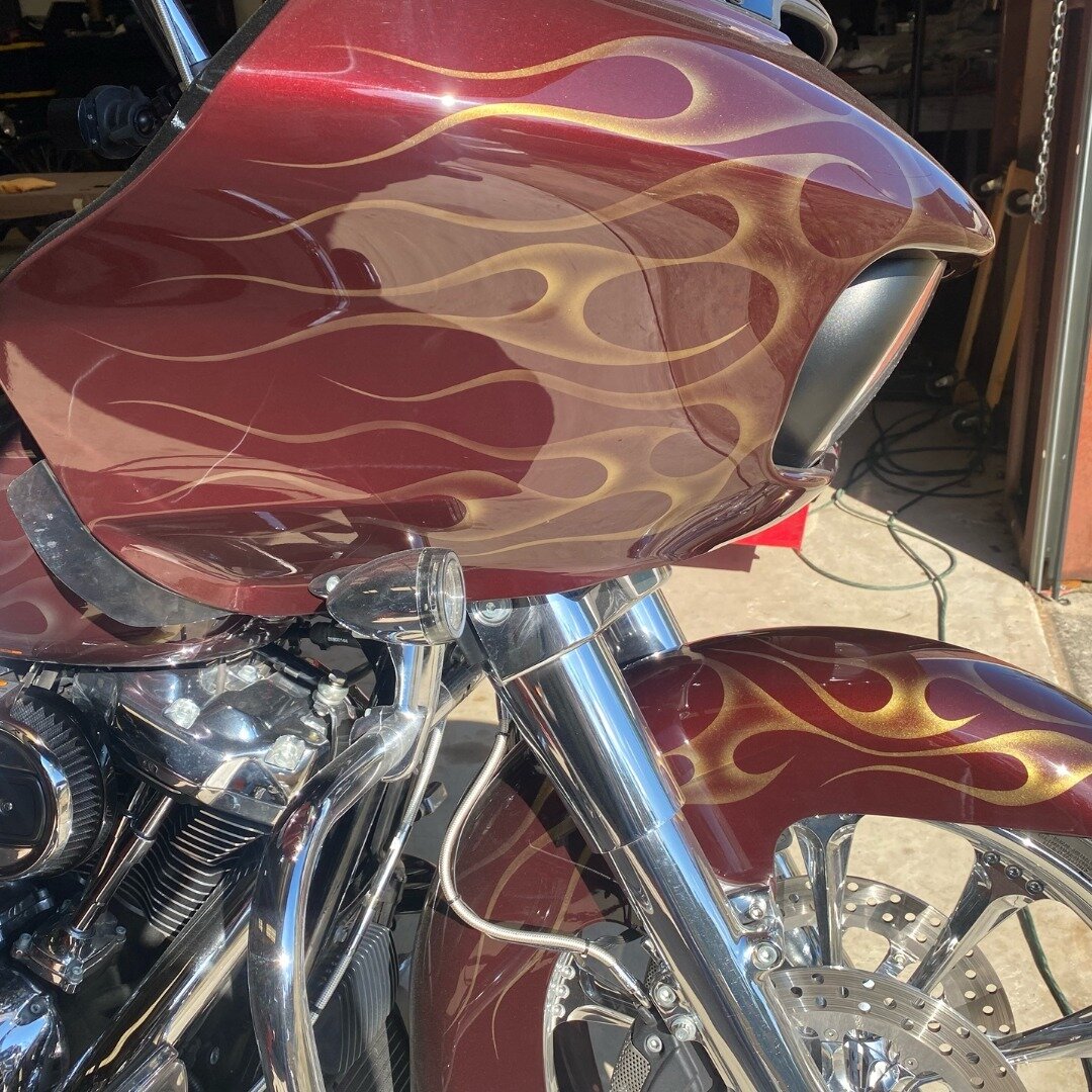 We've kicked this roadglide up a notch by incorporating some gold pearl ghost flames over the factory paint, creating a unique custom appearance.