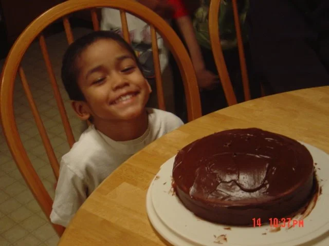 Alexander with his cake.JPG
