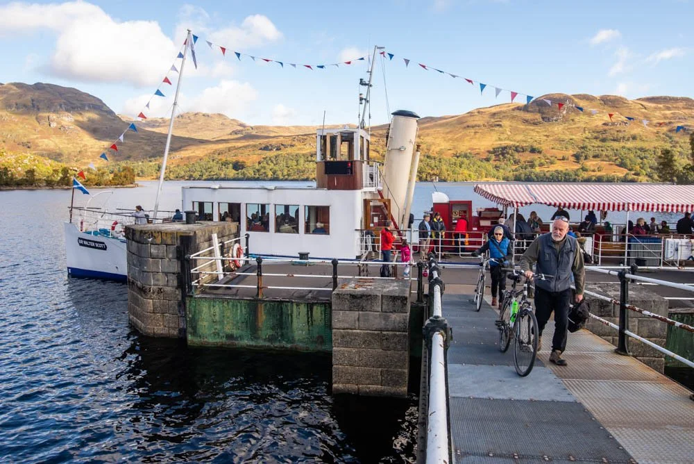 Cyclists coming off Steamship Sir Walter Scott, Loch Katrine
