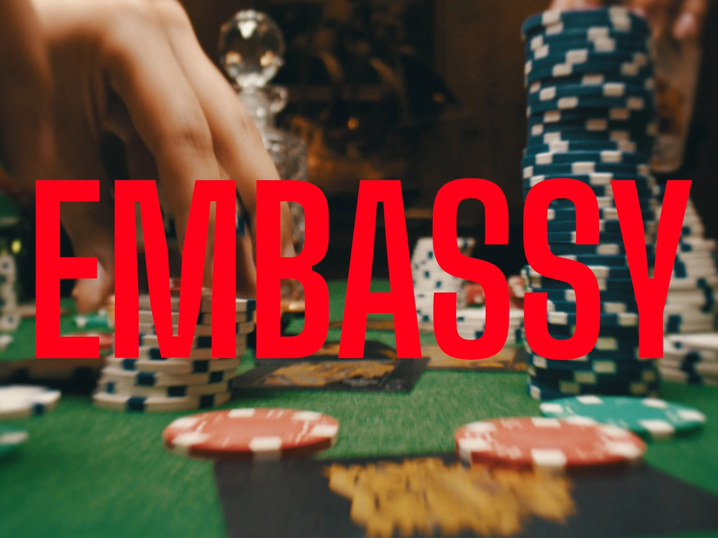 A hand places poker chips onto a green velvet table, The Secret Life of Props