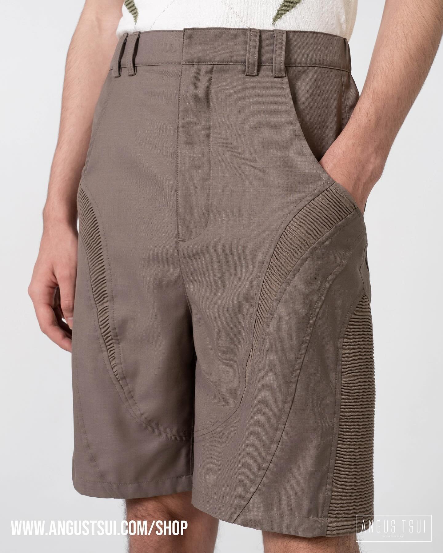 Signature Multi-Panelled Shorts ‣

These otherworldly exoskeleton shorts are made from a Dune Beige extra fine supreme wool fabric. Unique multi-panel pattern cutting designs enhance the signature ANGUS TSUI otherworldly constructed silhouette. Sculp