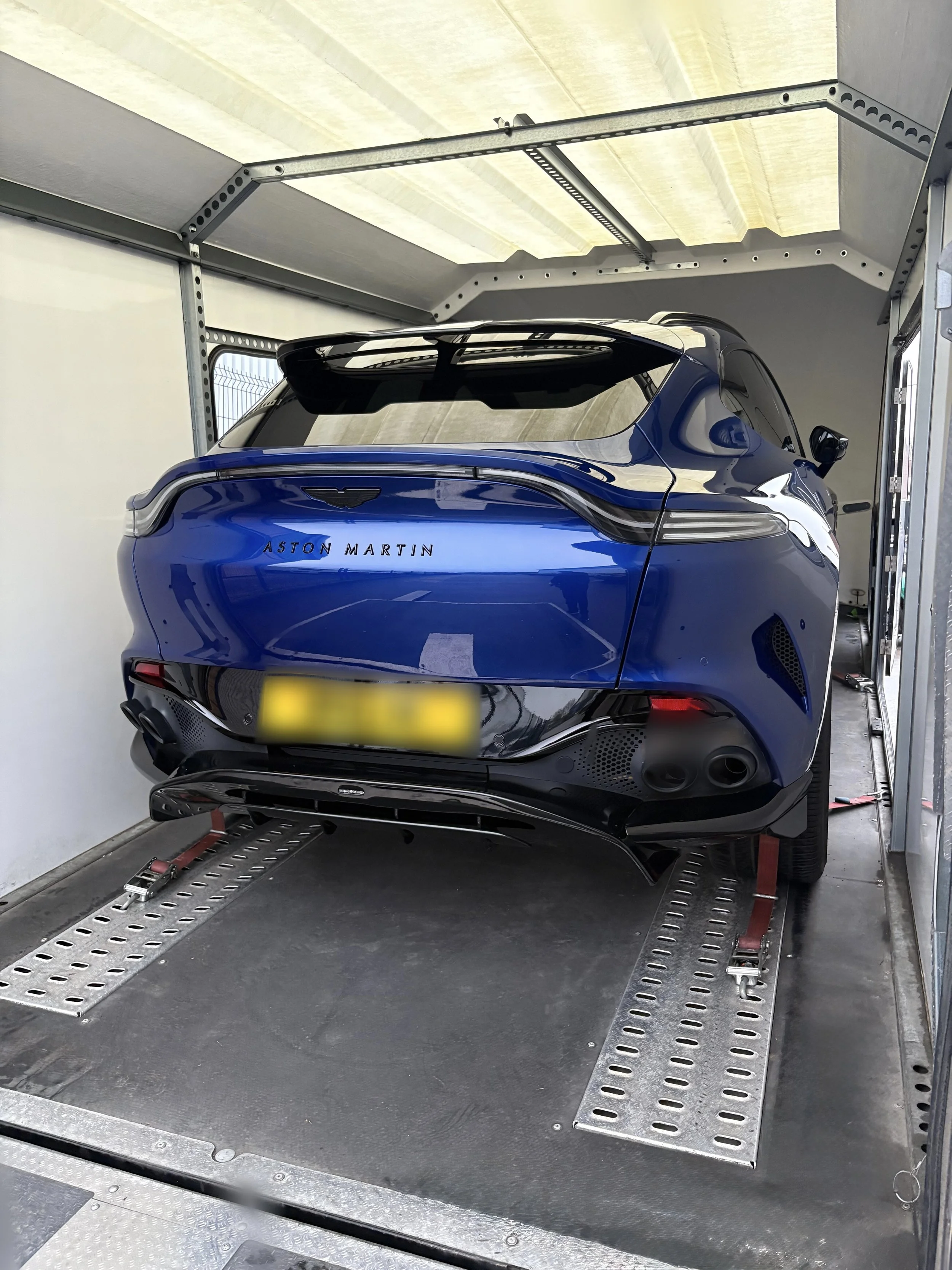 Strategic Partnership with Aston Martin: A New Standard in Luxury Vehicle Transport