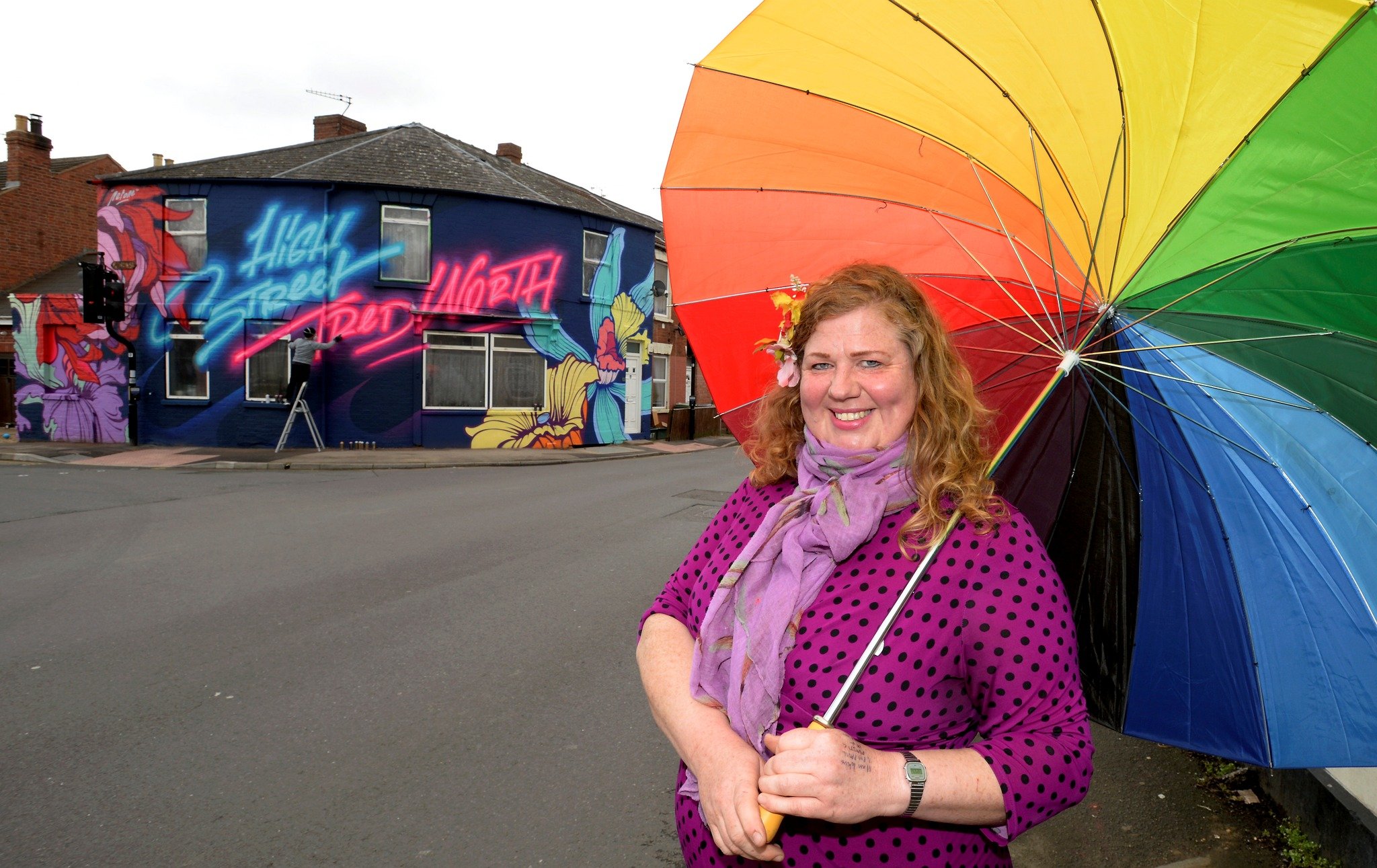 HIGH ST TREWORTH WITH RAINBOW UMBRELLA.. PAUL NICHOLS.jpg