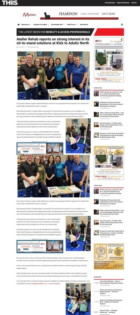 Screenshot of a website article from Thiis website showing a group of smiling standing frame specialists at an exhibition.