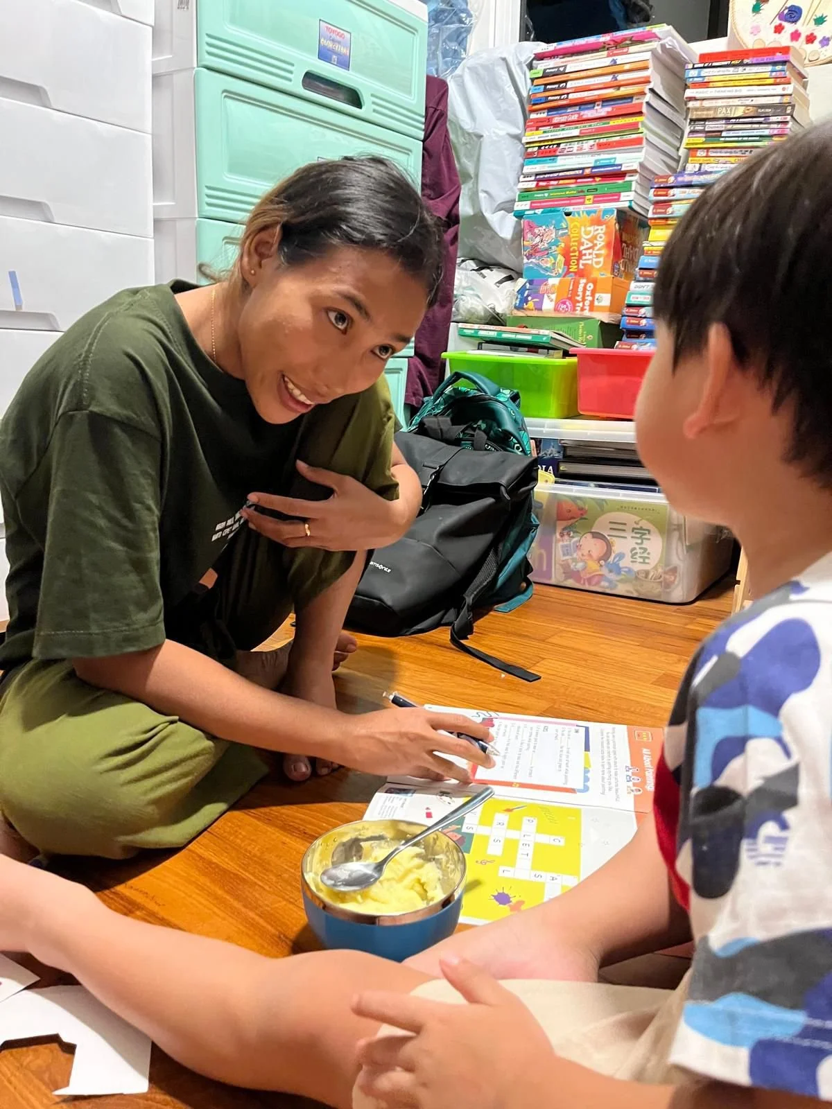 Indonesian Maid teaching child