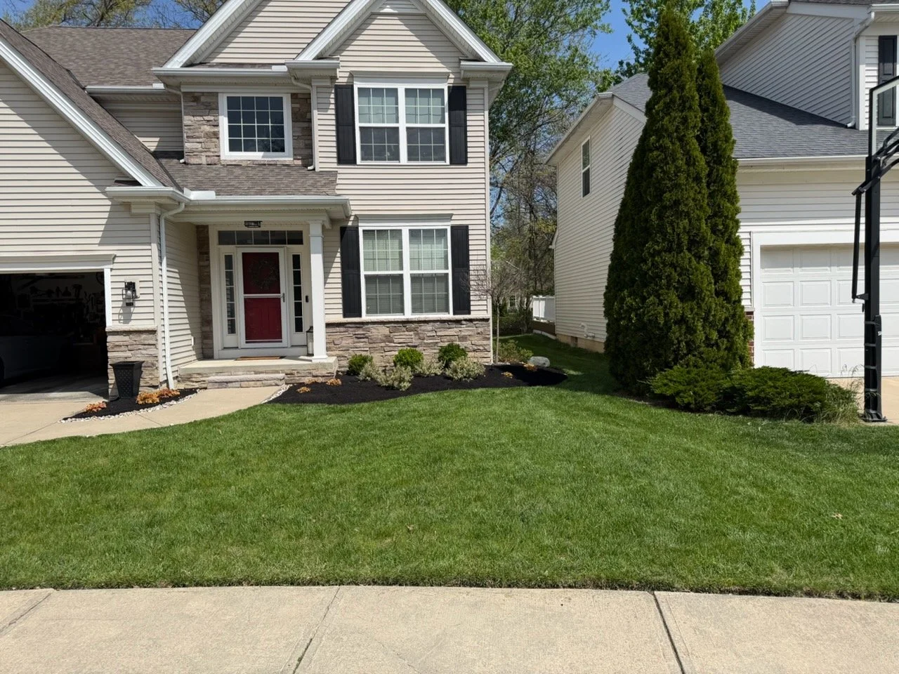 Maintained residential lawn and landscape by King Cut Lawn Care