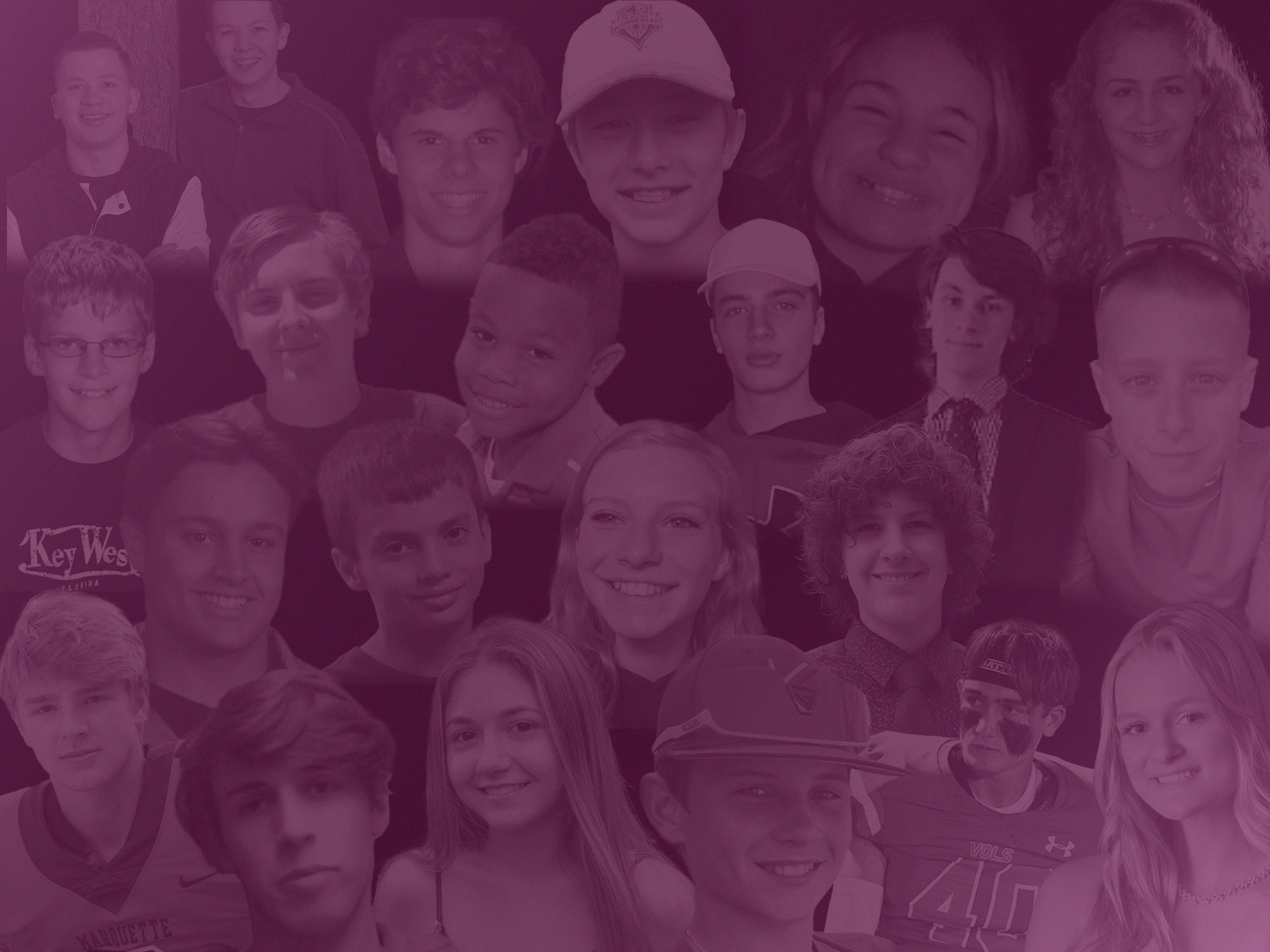 A group of teenagers smiling and posing together for a photo.