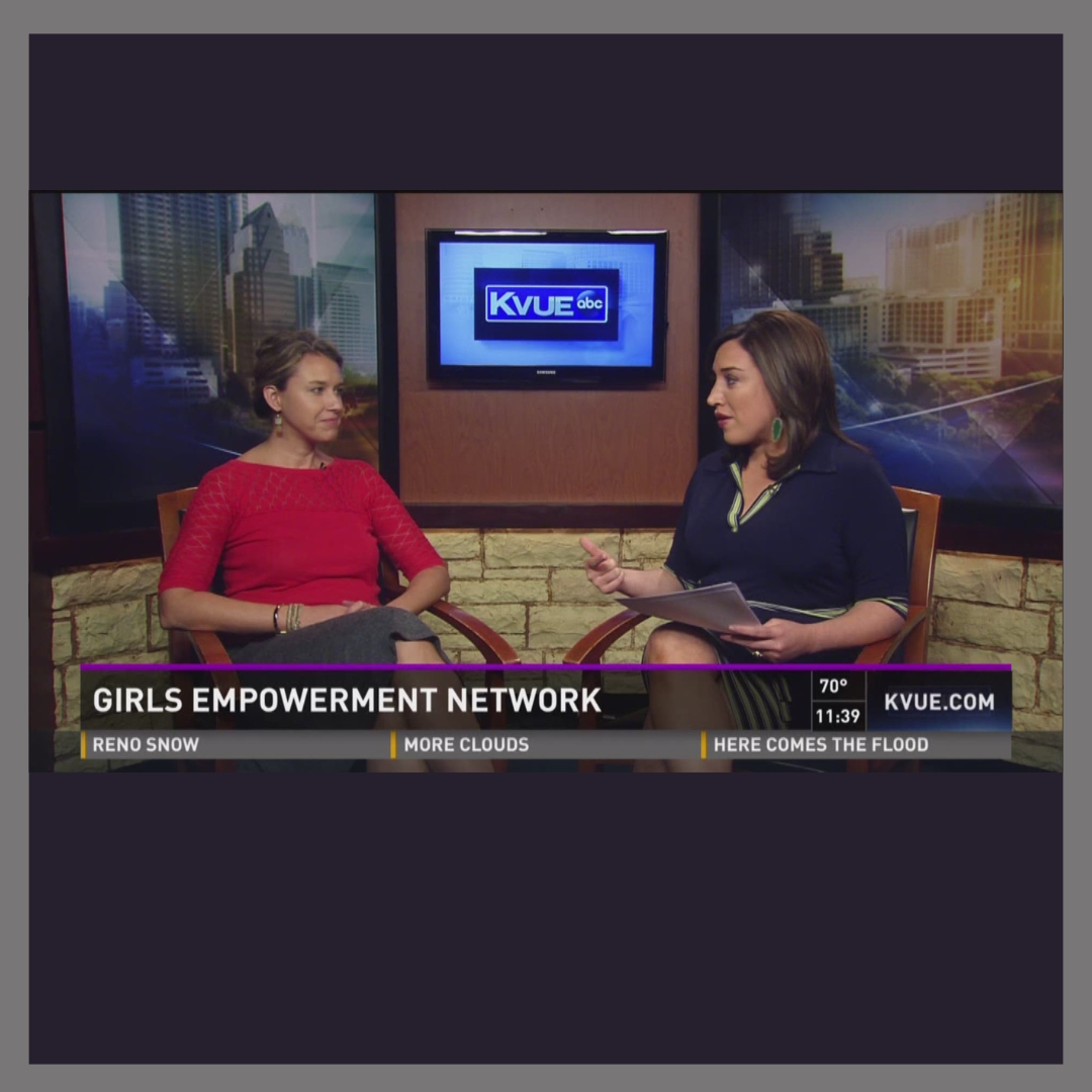 TV studio interview discussing Girls Empowerment Network with two women seated, TV screen displaying KVUE logo in background.