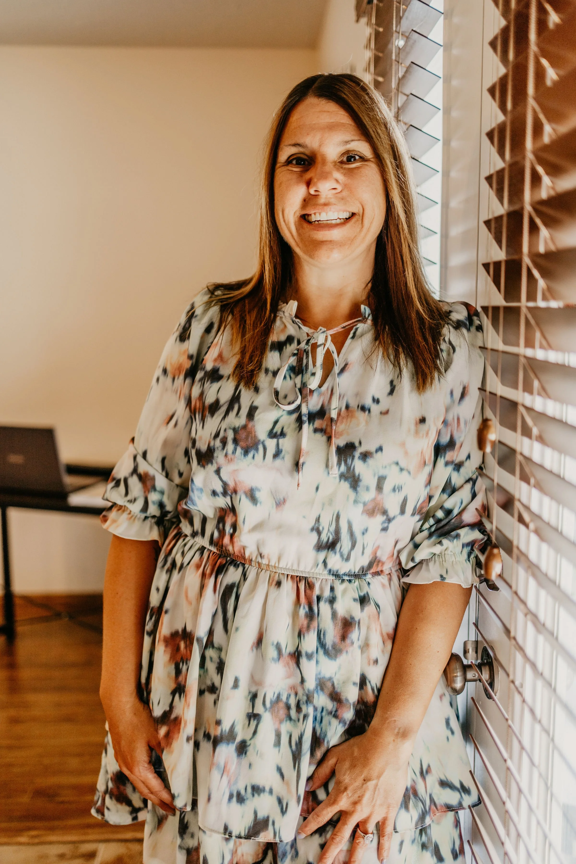 Melissa, founder of Serenity Reiki by Mel, specializing in Reiki, mediumship, and holistic healing in Red Deer, Alberta.